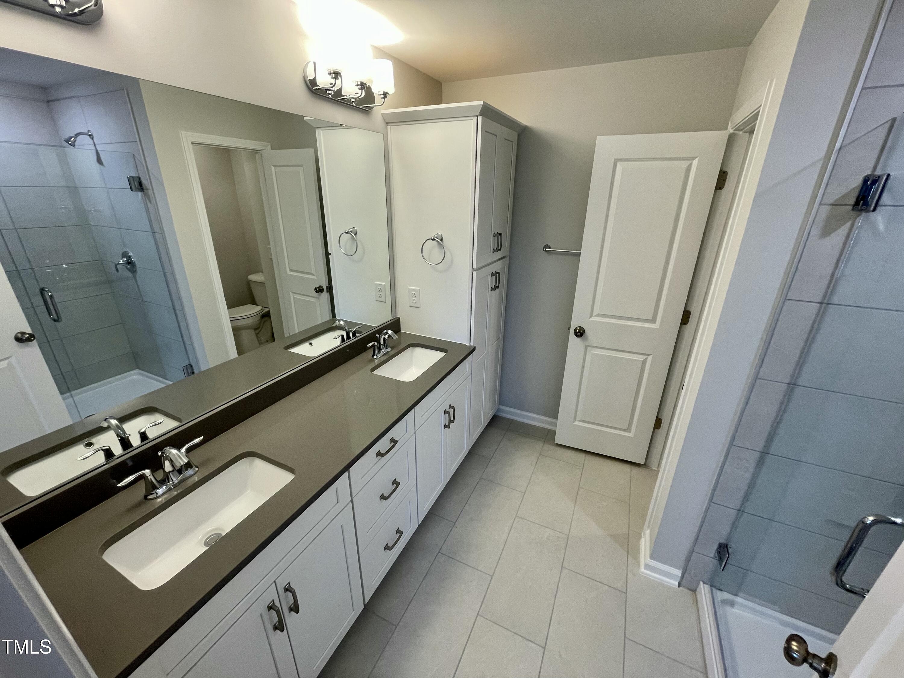 2103 Lambert Road, Unit 62 Cary, NC 27519 - Photo 28 of 77 19. primary luxury bath