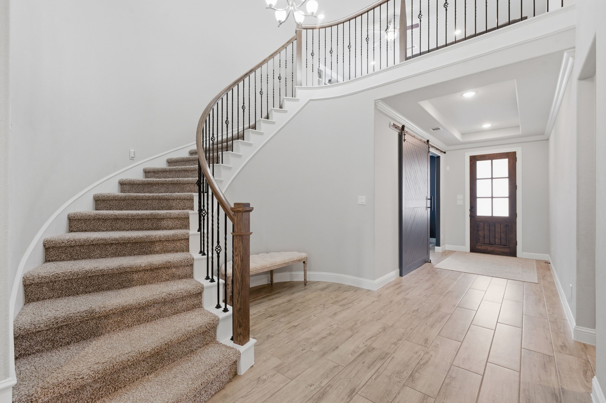 4242 Orchard Pass Drive Spring, TX 77386 - Photo 13 of 50 2 Story Stairwell w/Iron Spindles beyond Entry will Impress Your Guests