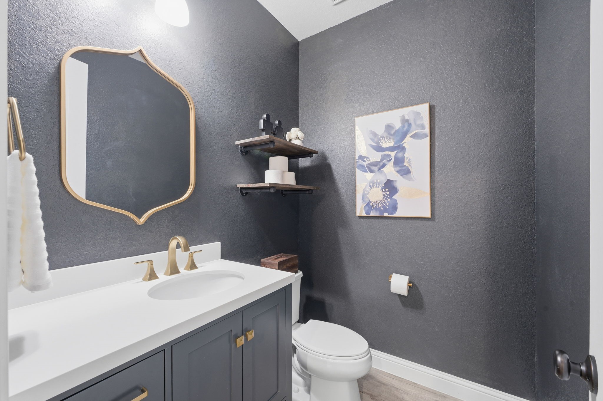 4242 Orchard Pass Drive Spring, TX 77386 - Photo 30 of 50 Elegant Powder Bath adorned with Quartz Vanity, Undermount Sink and Gold Accents