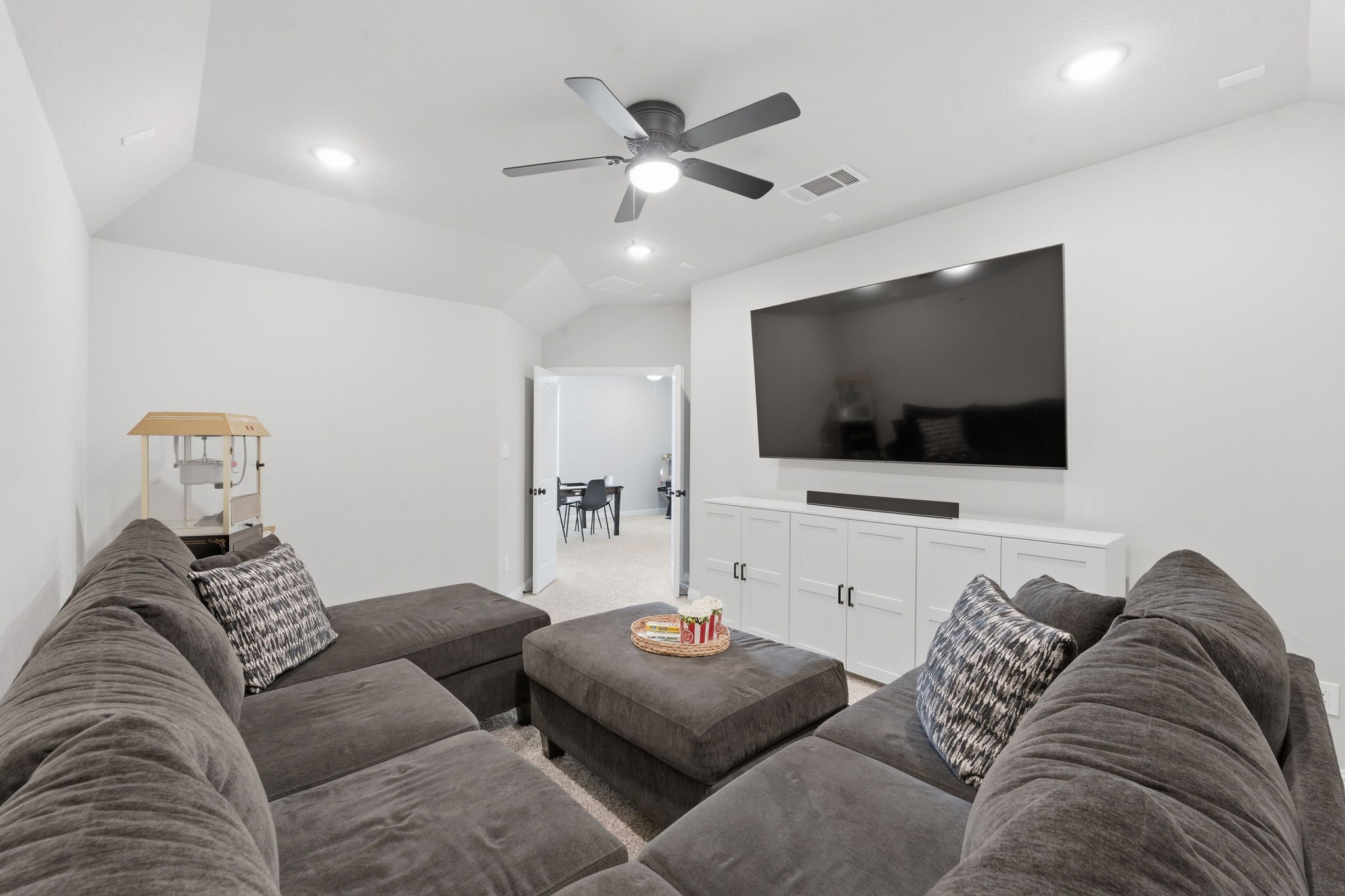 4242 Orchard Pass Drive Spring, TX 77386 - Photo 9 of 50 Upstairs Media Room Prewired for Sound with 5.1. Recessed Lighting, Ceiling Fan and Room for a Large Seating