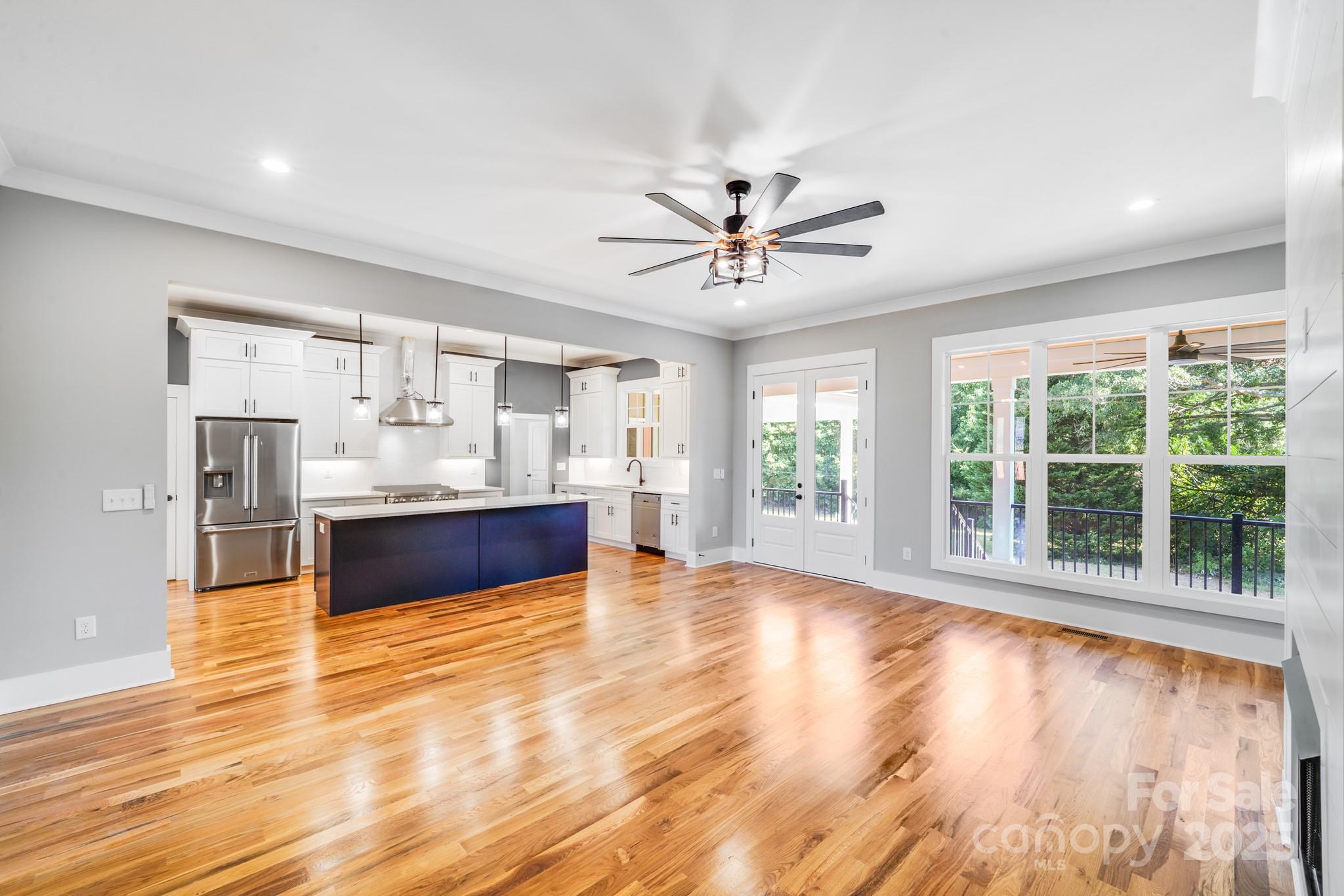 203 Nixon Road Belmont, NC 28012 - Photo 13 of 47 a large white kitchen with a large window and stainless steel appliances