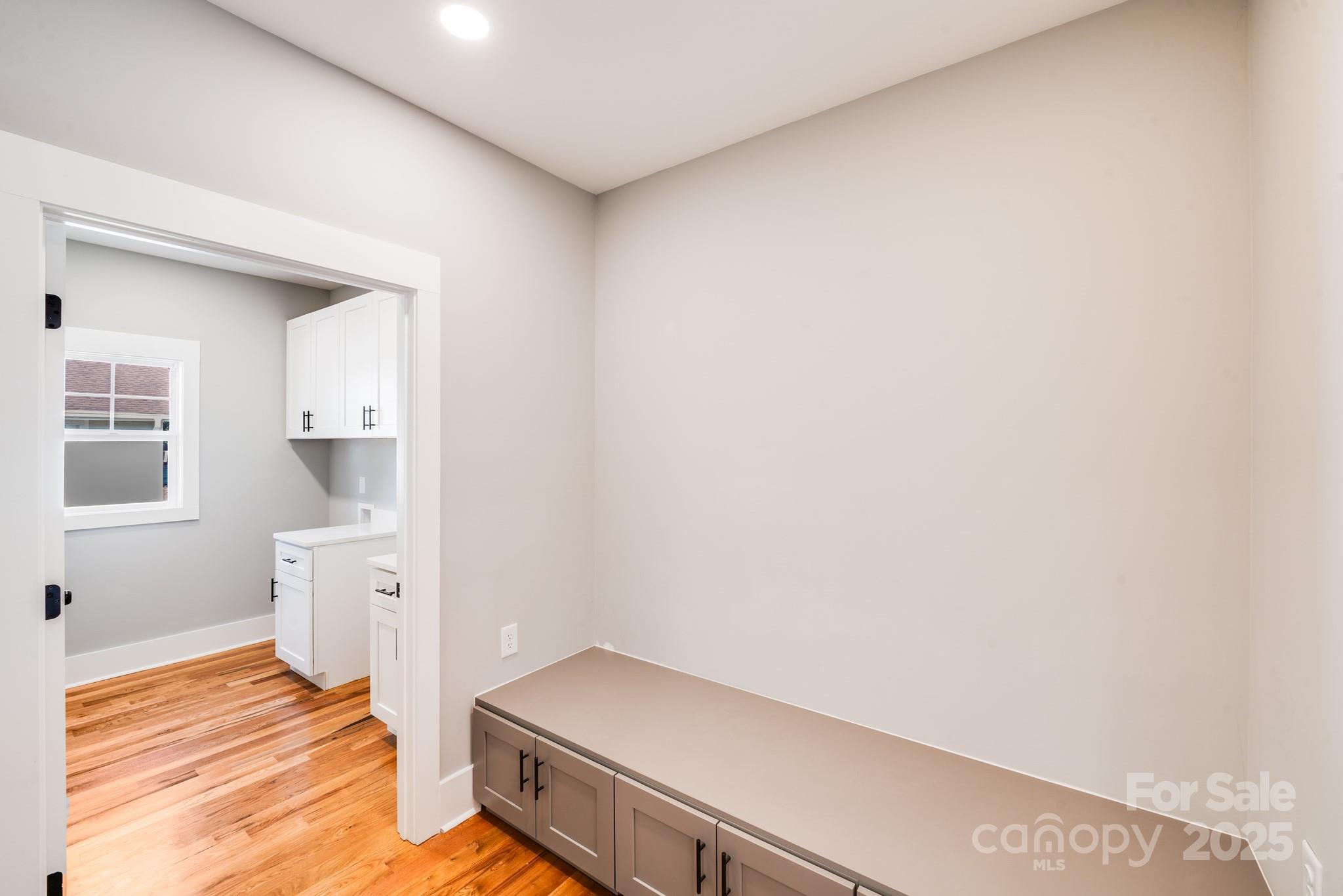 203 Nixon Road Belmont, NC 28012 - Photo 21 of 47 a room with a bed and cabinets