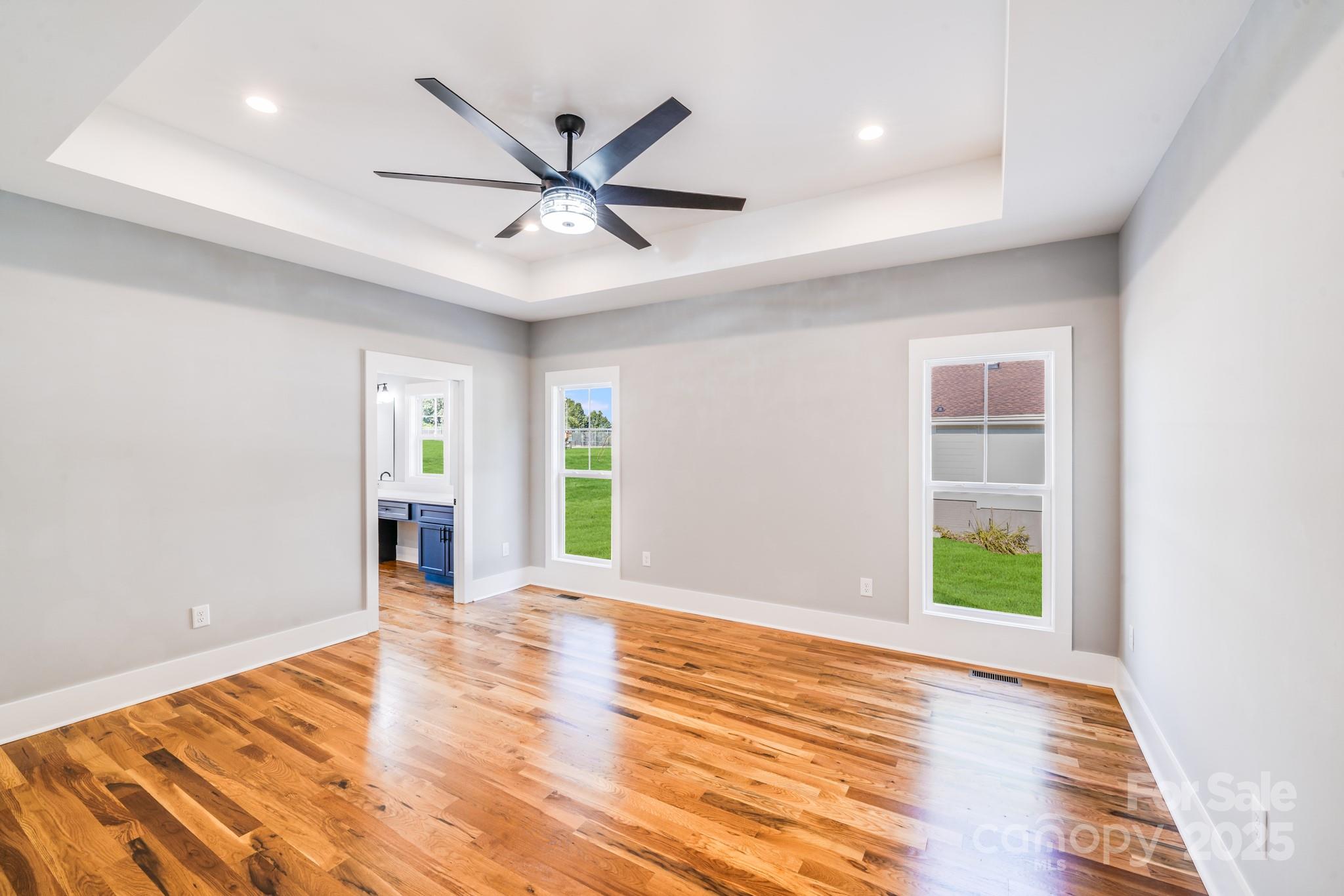 203 Nixon Road Belmont, NC 28012 - Photo 22 of 47 wooden floor in an empty room with a window