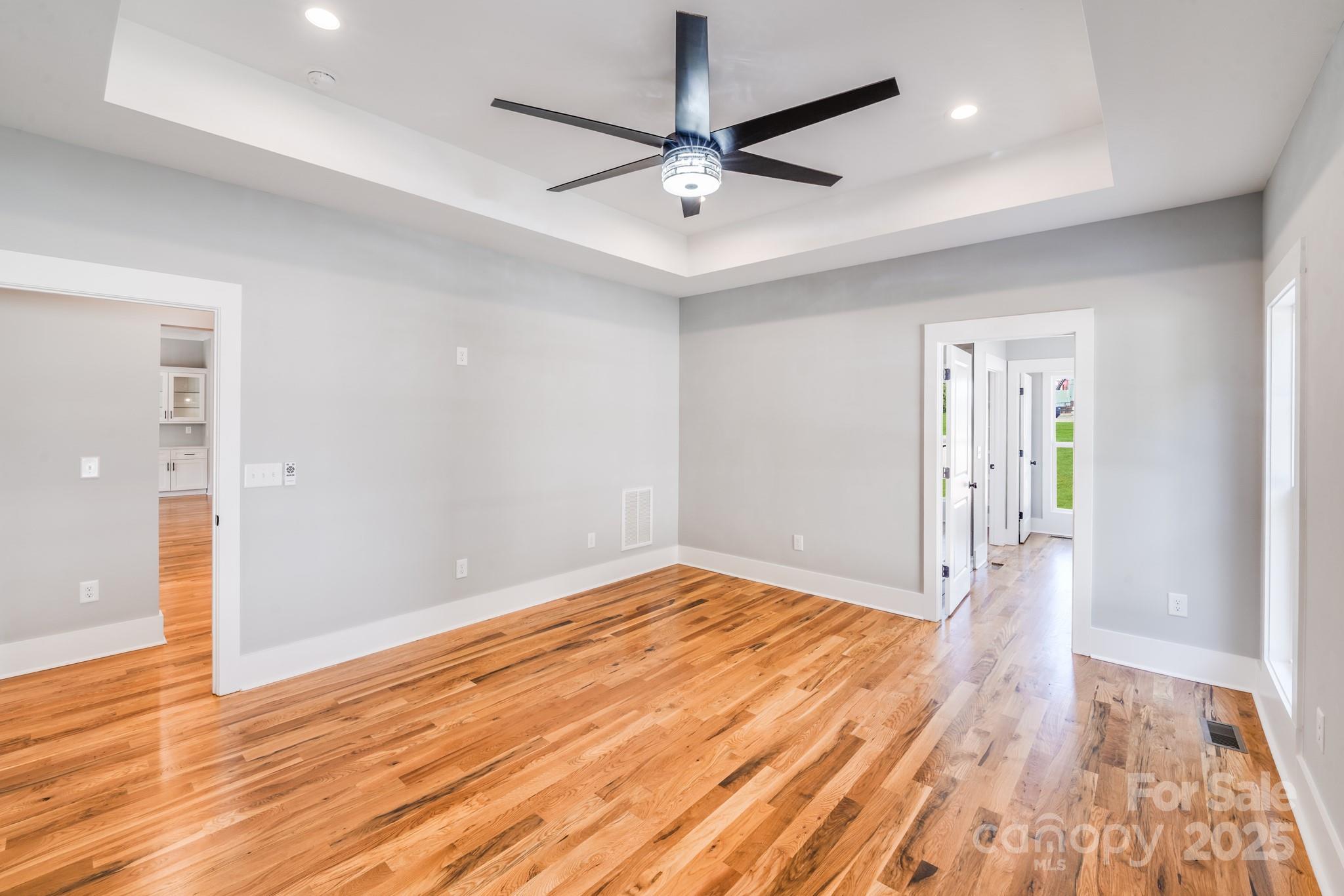 203 Nixon Road Belmont, NC 28012 - Photo 24 of 47 a view of room with wooden floor and ceiling fan