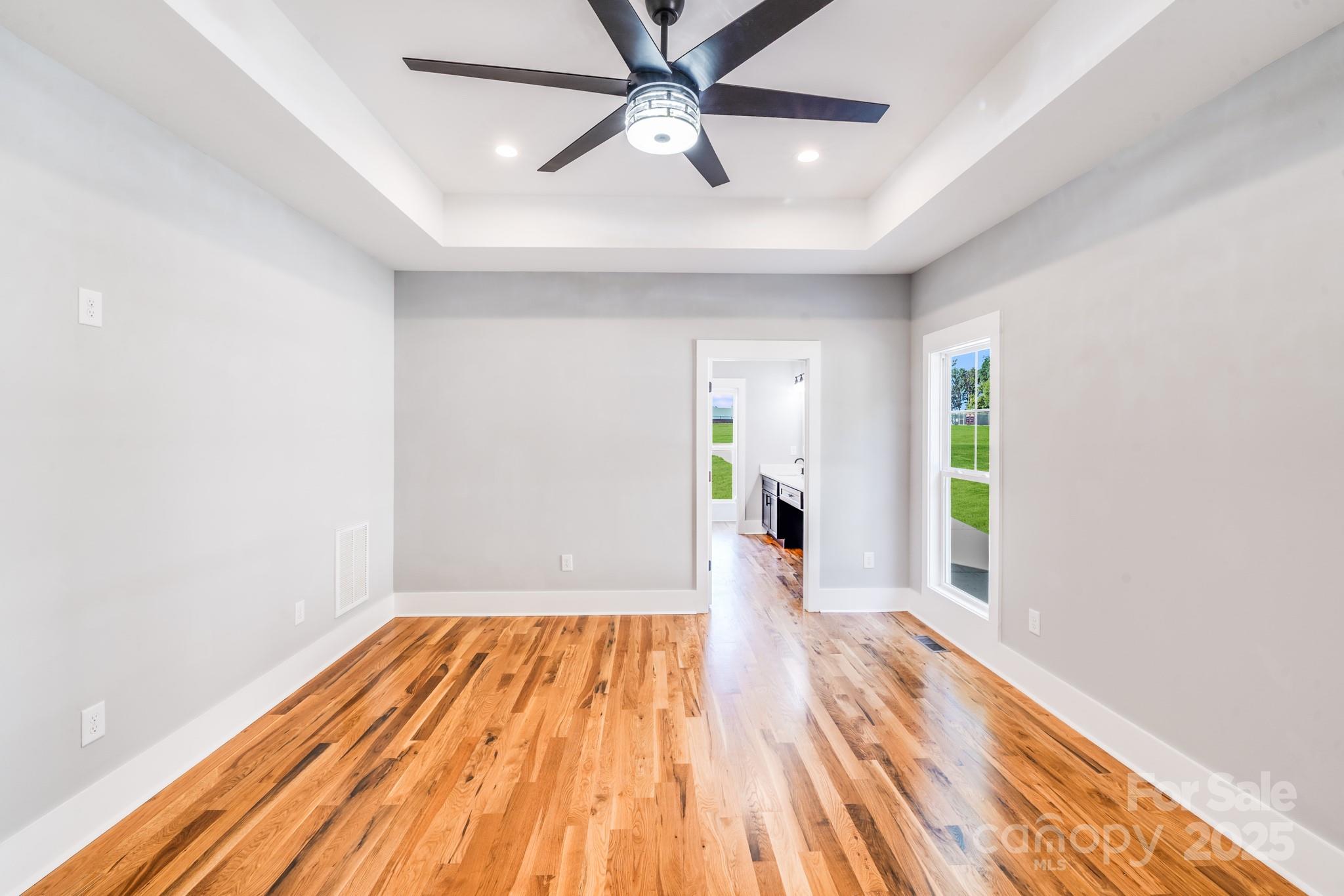 203 Nixon Road Belmont, NC 28012 - Photo 25 of 47 wooden floor in an empty room with a window