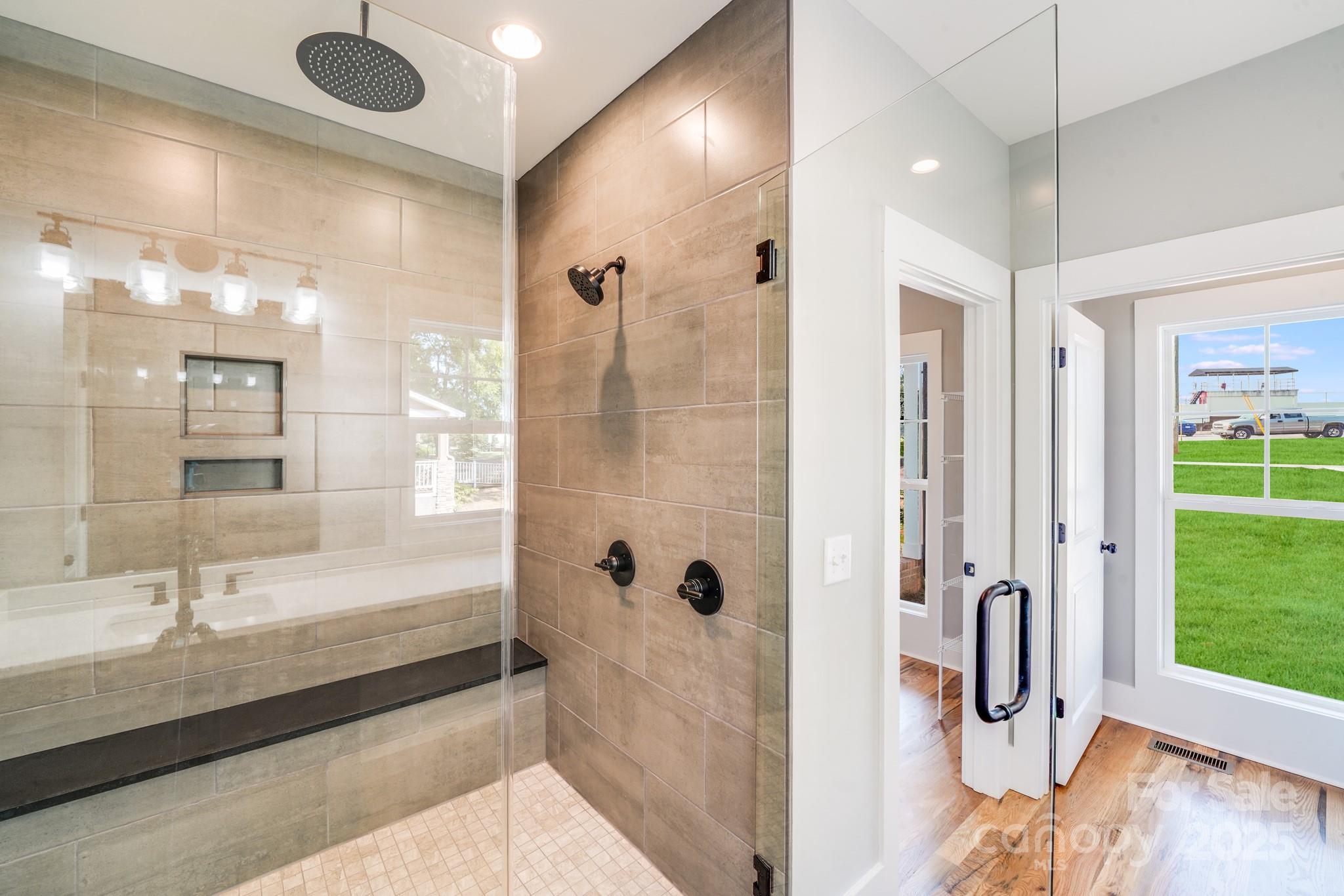 203 Nixon Road Belmont, NC 28012 - Photo 28 of 47 a bathroom with a tub shower and sink