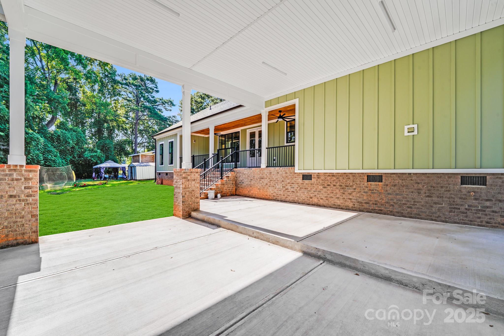 203 Nixon Road Belmont, NC 28012 - Photo 44 of 47 a view of a house with a garden