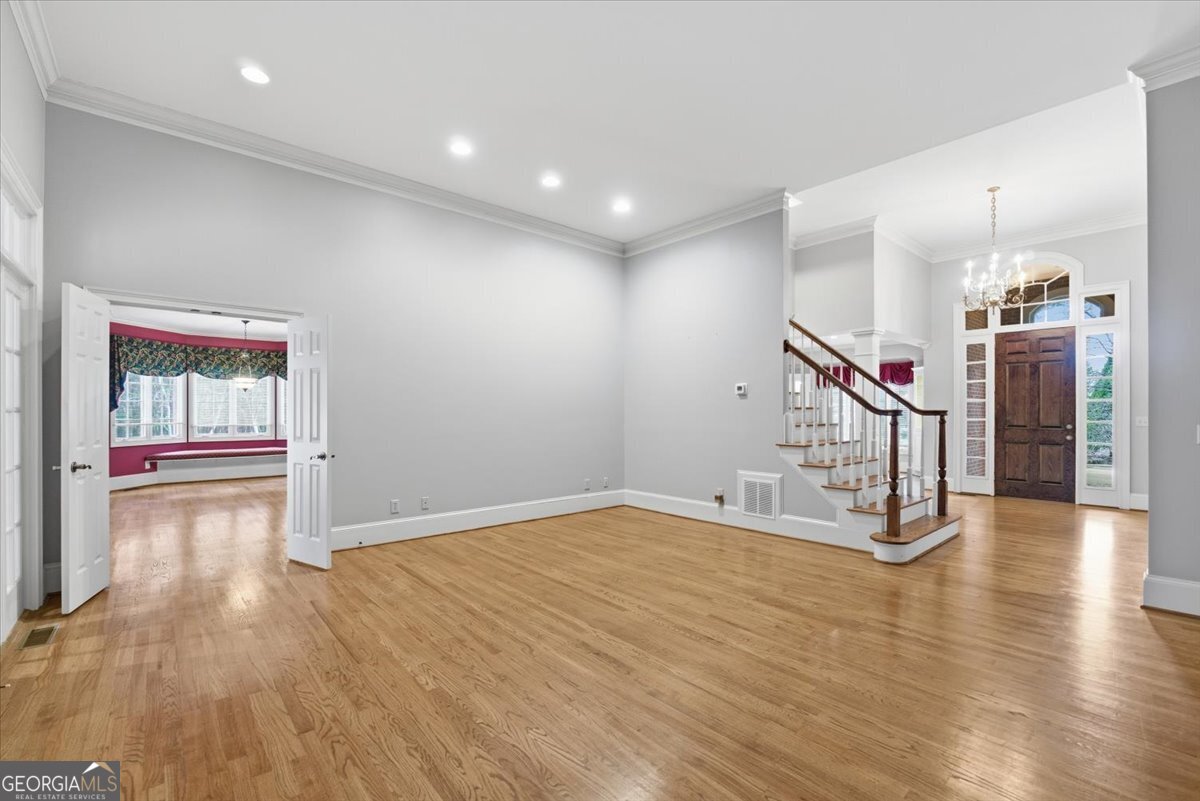2040 Wynbrooke Place Madison, GA 30650 - Photo 16 of 60 a view of empty room with wooden floor