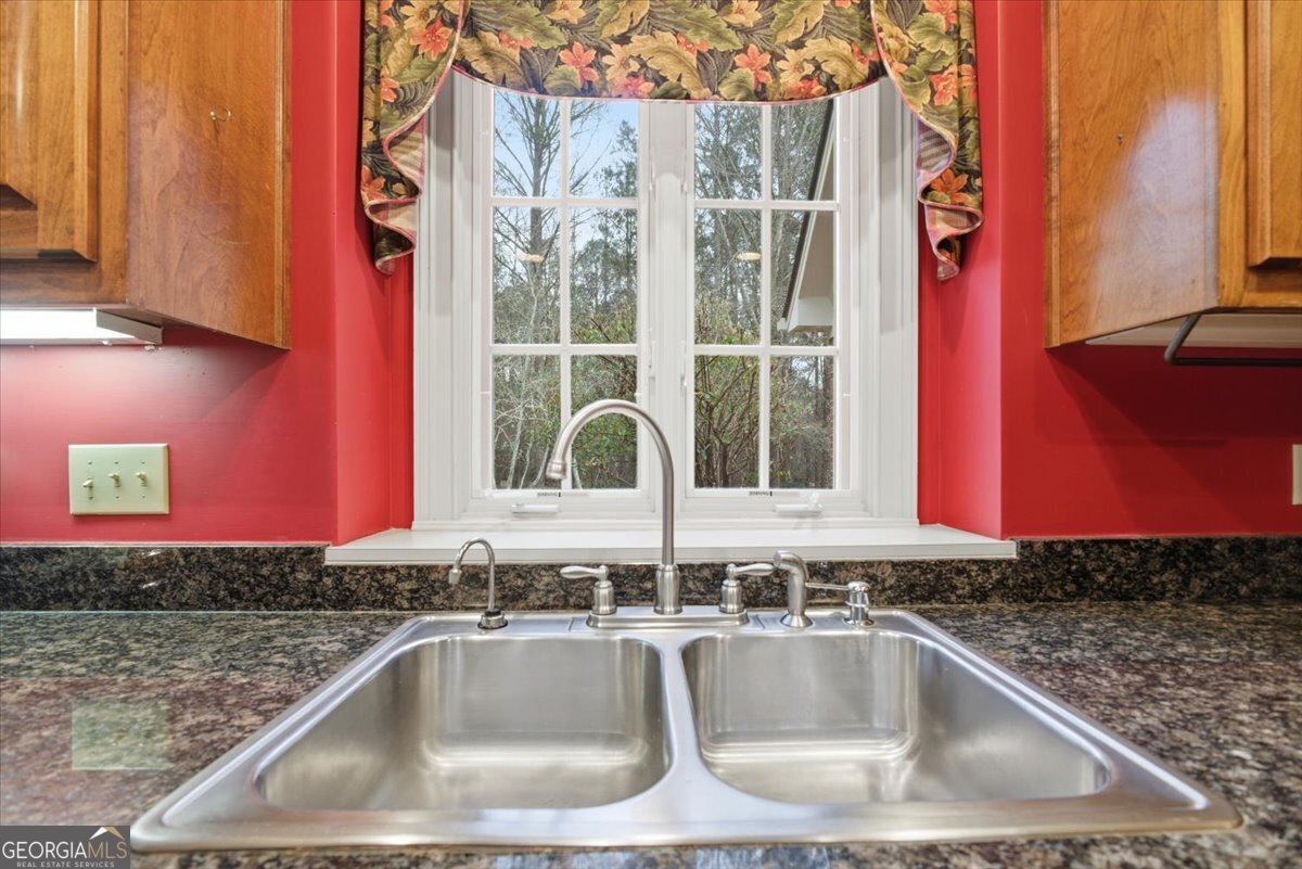 2040 Wynbrooke Place Madison, GA 30650 - Photo 21 of 60 a close view of sink and tap