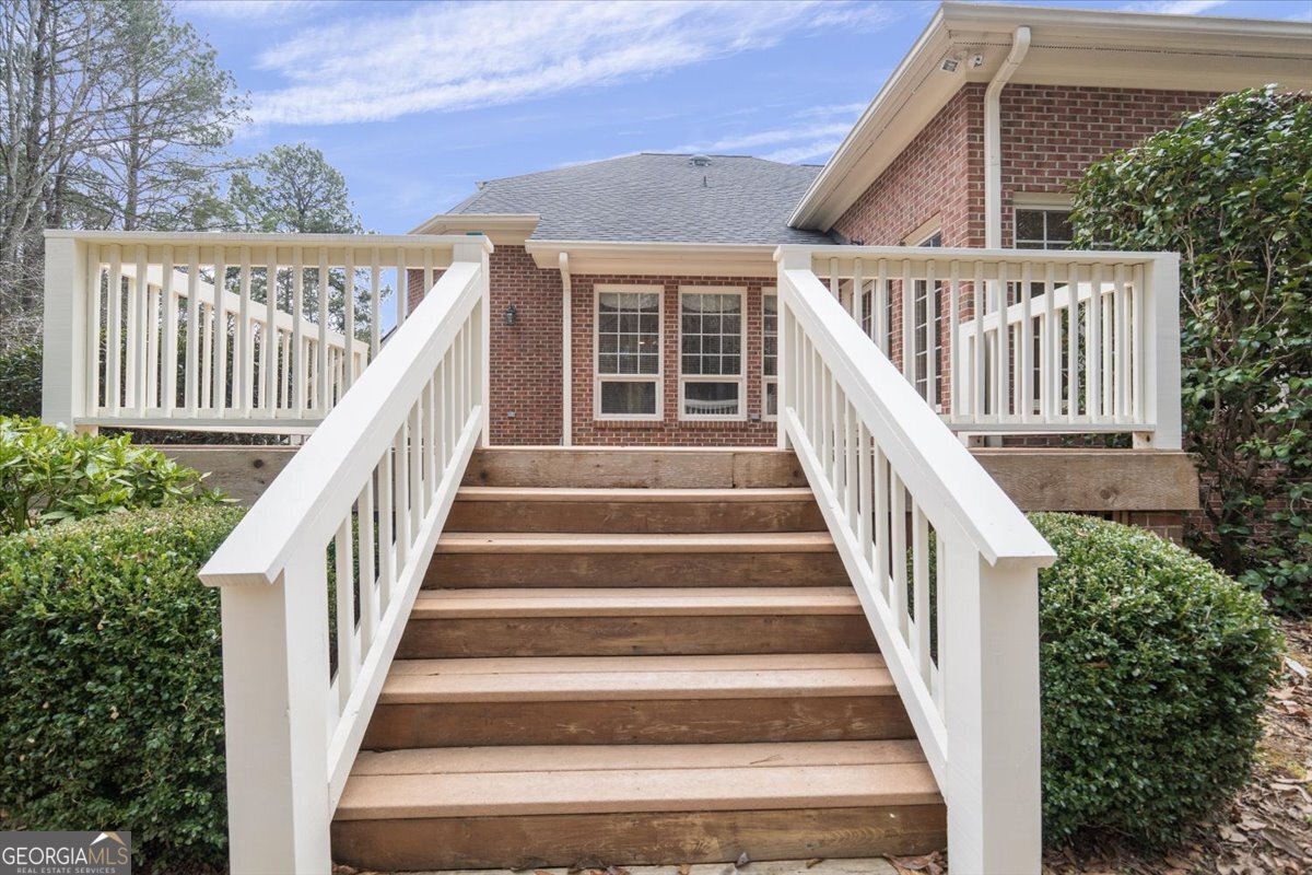 2040 Wynbrooke Place Madison, GA 30650 - Photo 40 of 60 a view of entryway with staircase and wooden floor