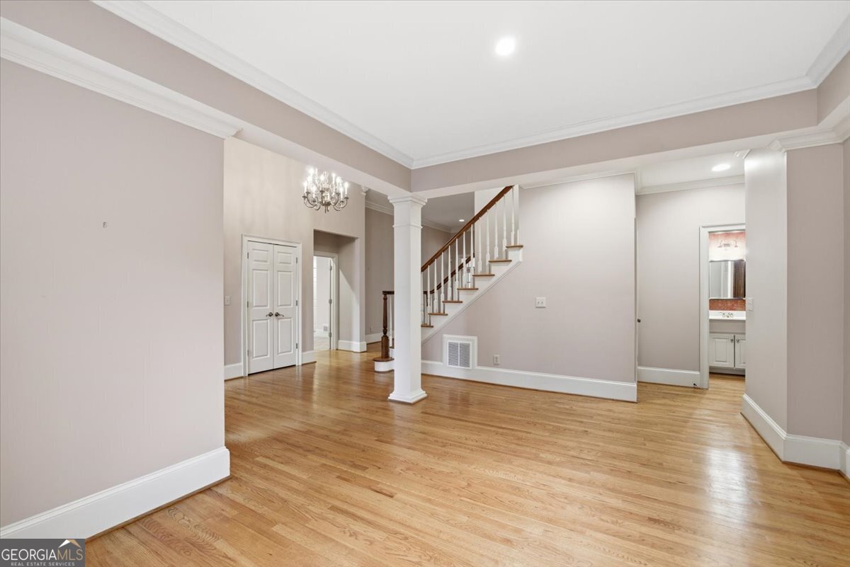 2040 Wynbrooke Place Madison, GA 30650 - Photo 5 of 60 a view of empty room with wooden floor