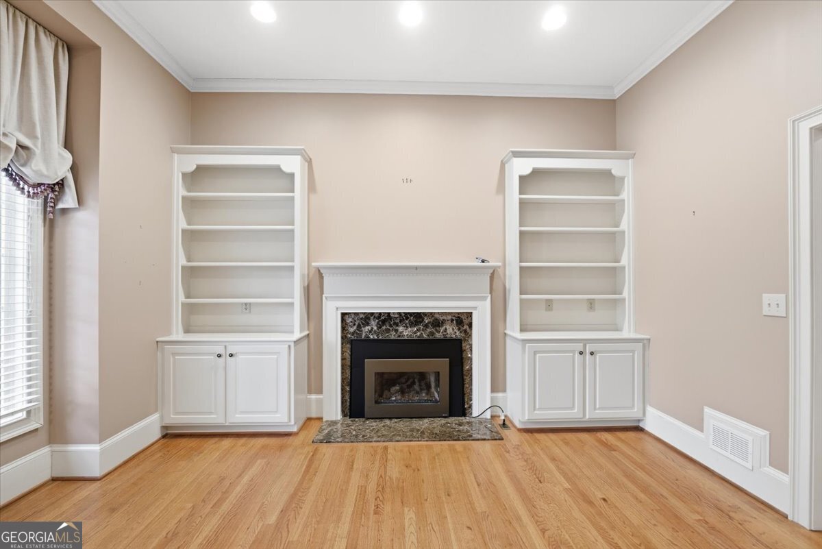 2040 Wynbrooke Place Madison, GA 30650 - Photo 7 of 60 a view of a livingroom with a fireplace and window