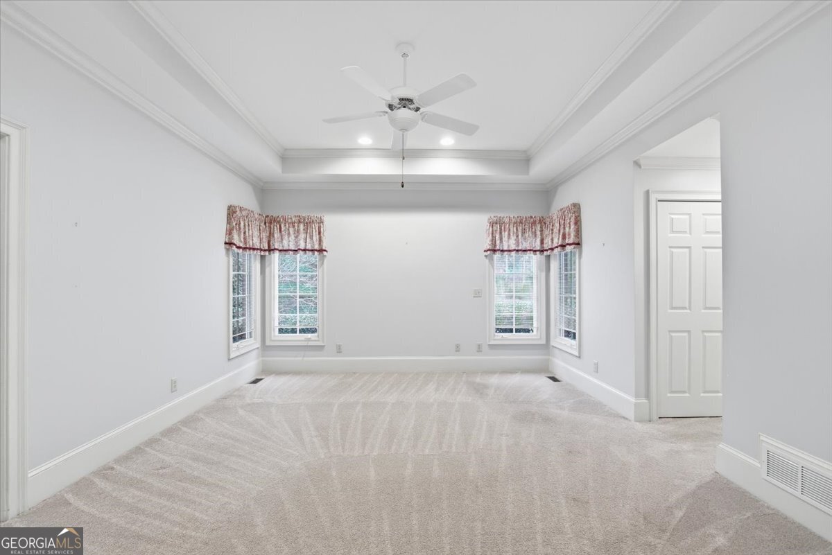 2040 Wynbrooke Place Madison, GA 30650 - Photo 8 of 60 a view of an empty room with a window