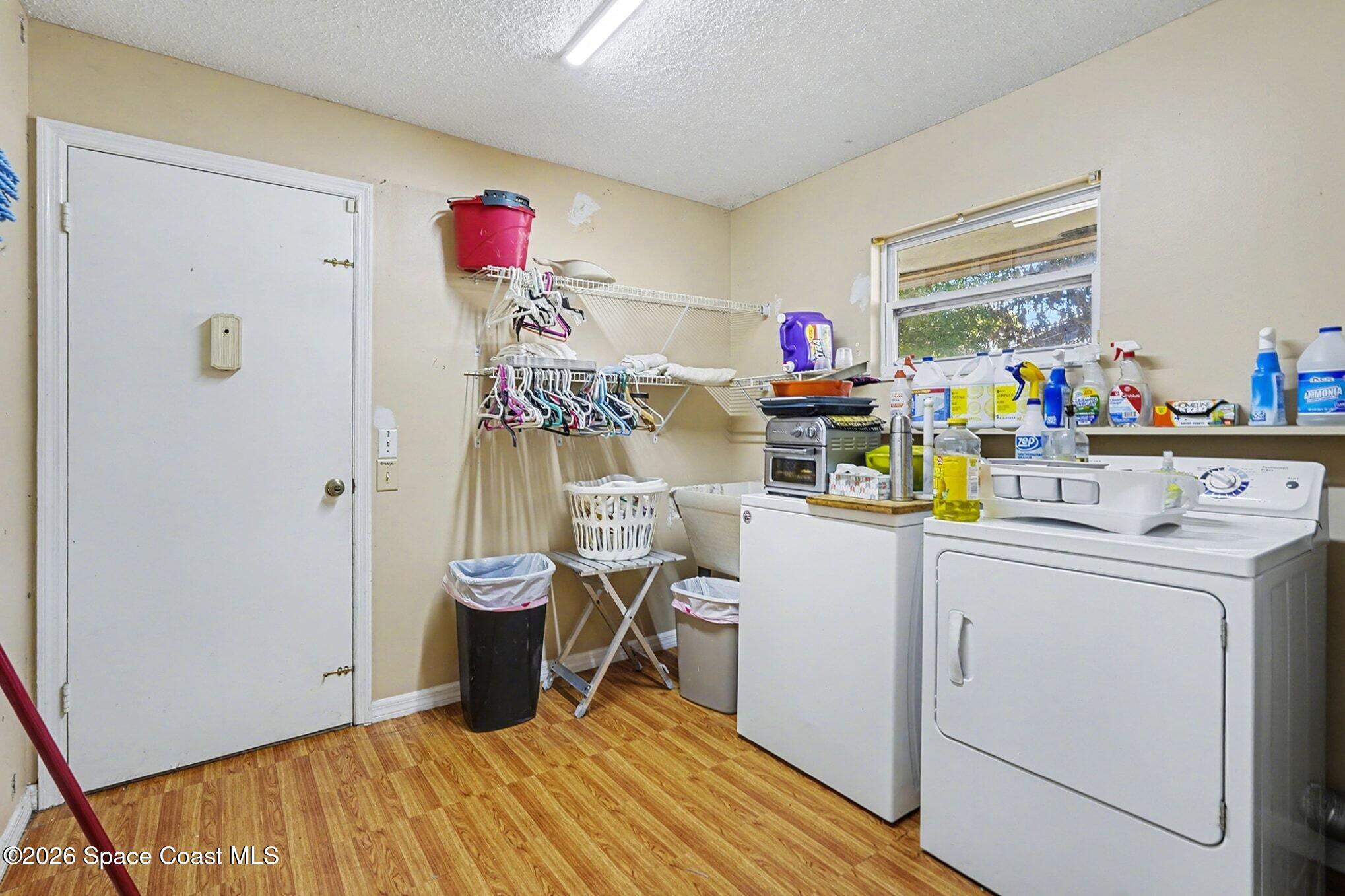 1351 Cherry Hills Road Northeast Palm Bay, FL 32905 - Photo 11 of 15 Laundry Room