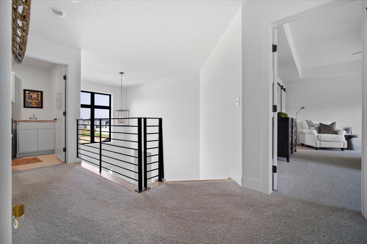 5305 Finlen Lane Bloomington, IL 61705 - Photo 22 of 42 a view of a livingroom with a furniture and staircase