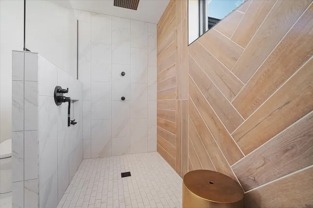 a bathroom with a sink and shower