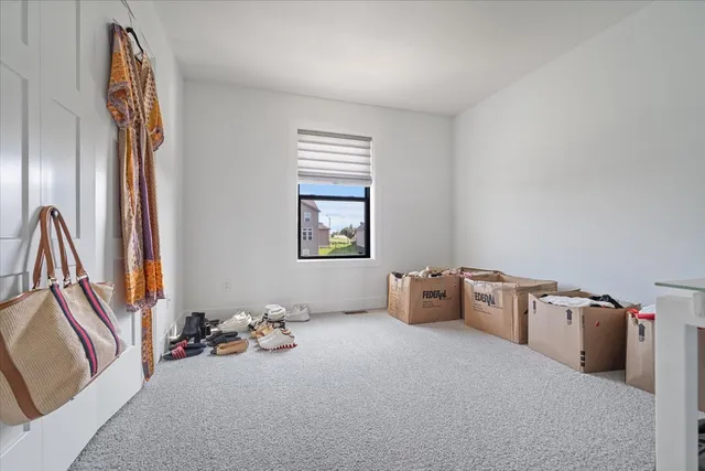 a room with furniture and a window