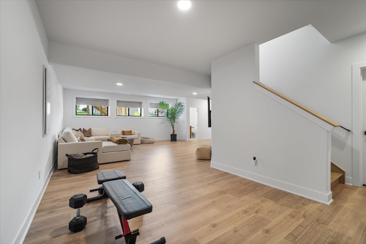 5305 Finlen Lane Bloomington, IL 61705 - Photo 35 of 42 a living room with furniture and a wooden floor