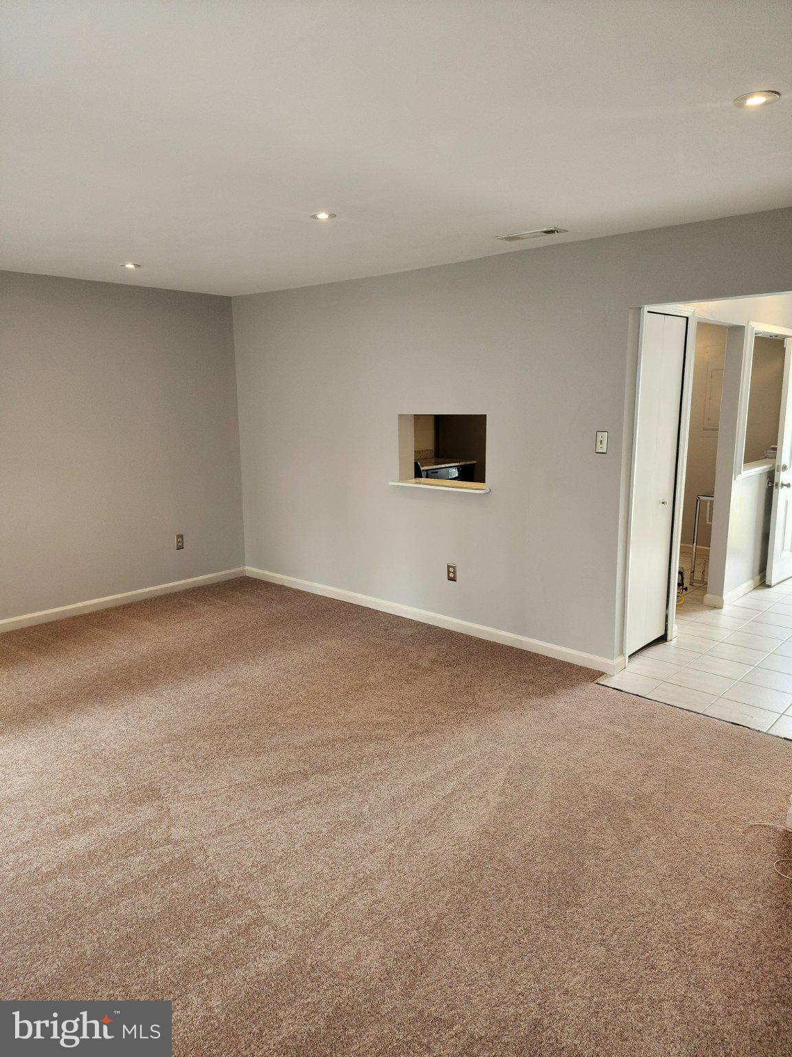 2384 Mitchellville Road Bowie, MD 20716 - Photo 18 of 44 a view of an empty room with wooden floor