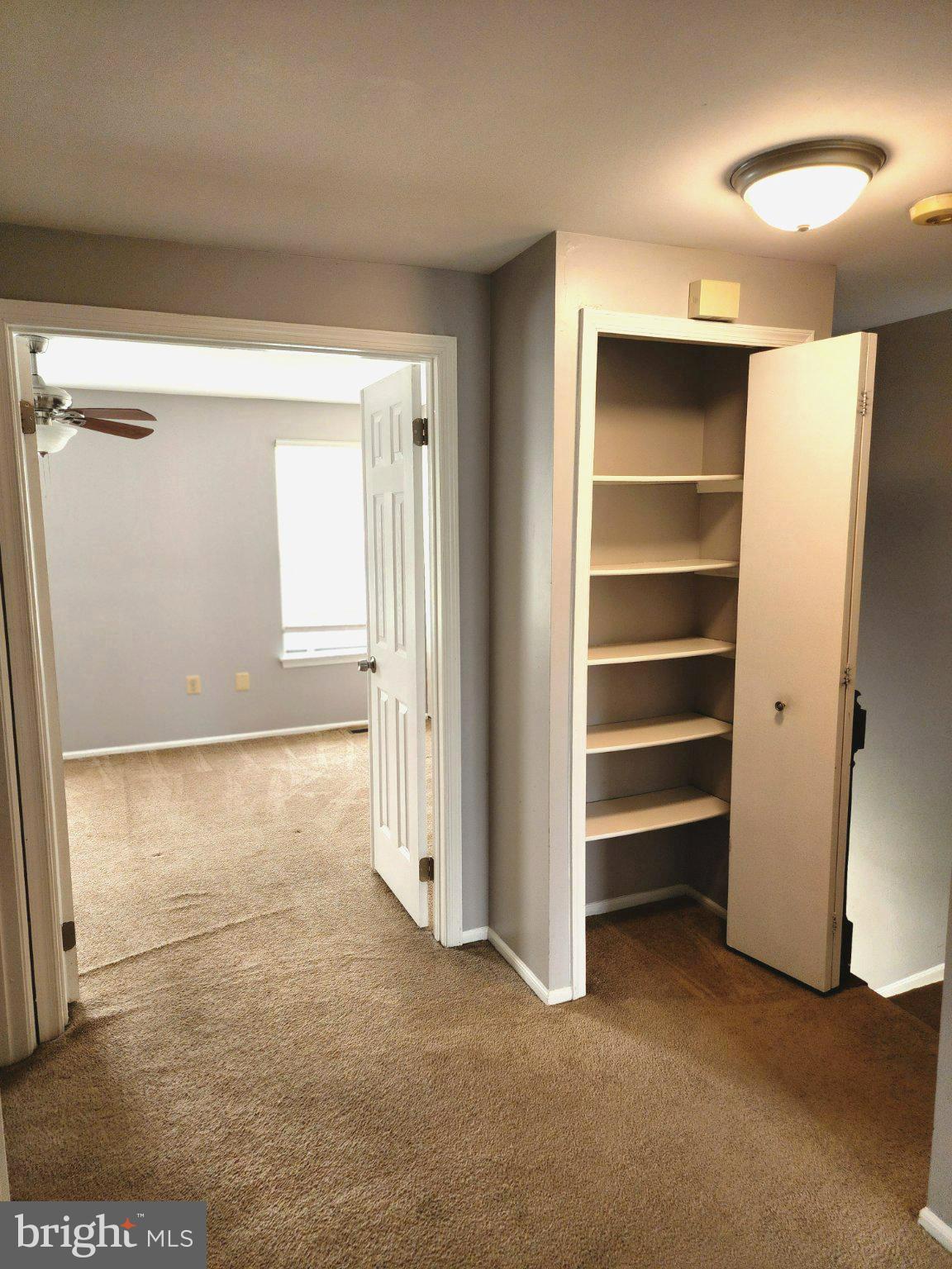 2384 Mitchellville Road Bowie, MD 20716 - Photo 26 of 44 a view of room with walk in closet and window