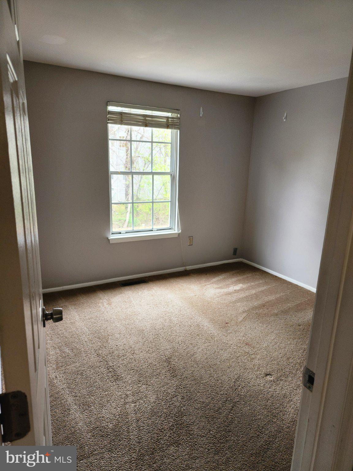 2384 Mitchellville Road Bowie, MD 20716 - Photo 36 of 44 an empty room with a window