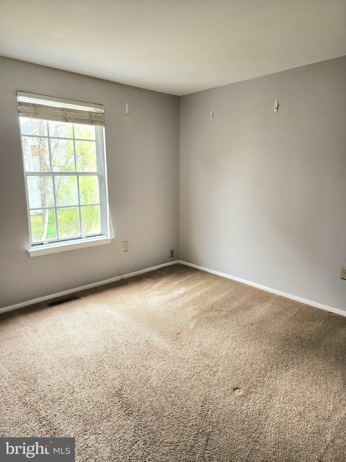 2384 Mitchellville Road Bowie, MD 20716 - Photo 39 of 44 an empty room with a window