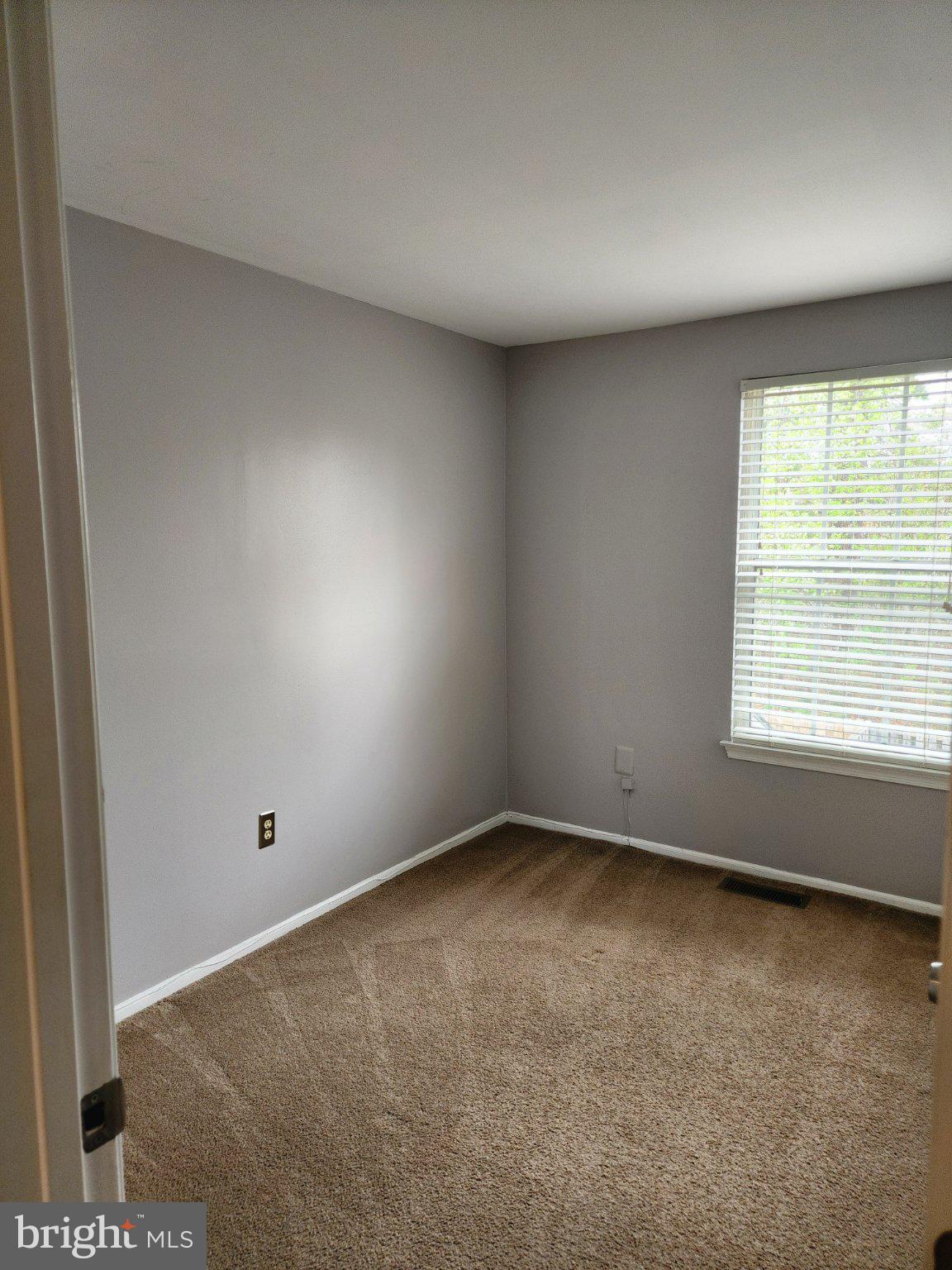 2384 Mitchellville Road Bowie, MD 20716 - Photo 42 of 44 an empty room with a window