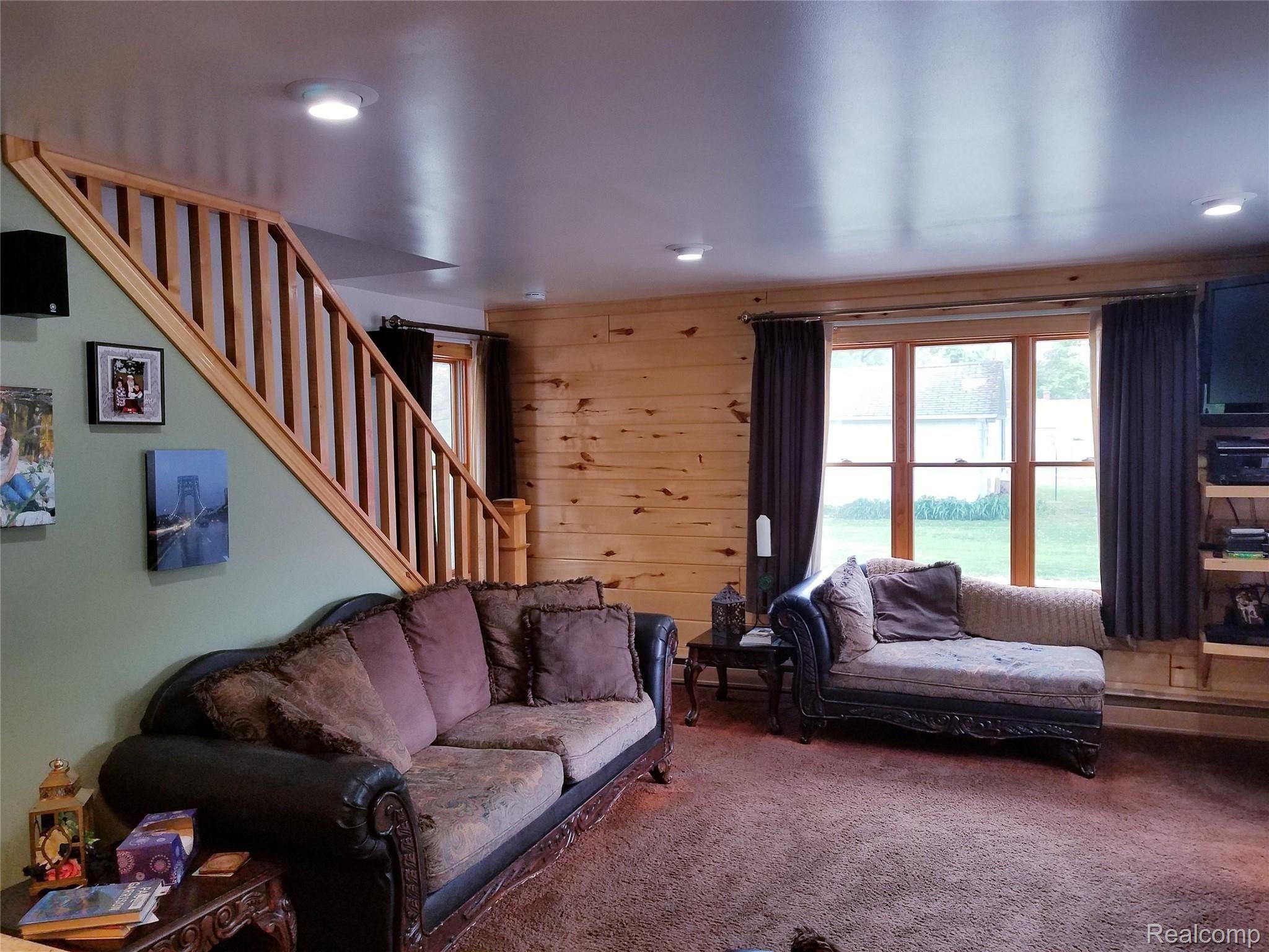 3211 North Belsay Road Flint, MI 48506 - Photo 44 of 62 Windows to the south and west with stairs to upper level.jpg