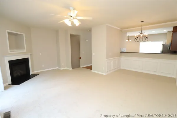 a view of a livingroom with a fireplace