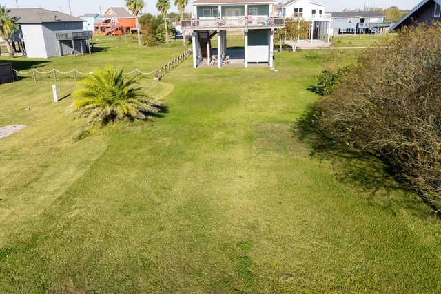 a aerial view of residential houses with outdoor space