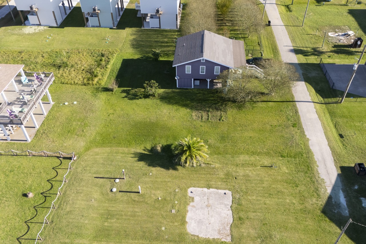 2109 1st Street Crystal Beach, TX 77650 - Photo 6 of 14 a aerial view of residential houses with outdoor space