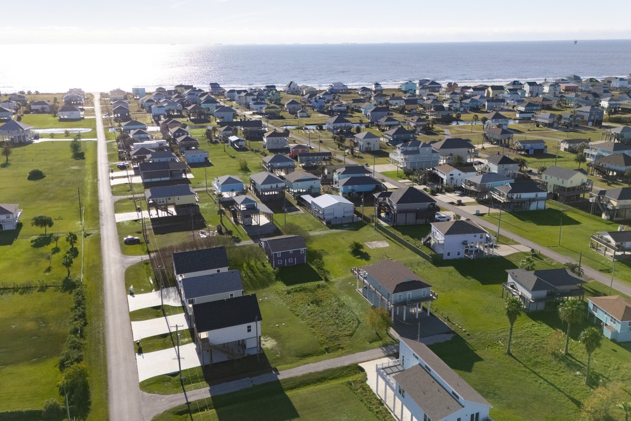 2109 1st Street Crystal Beach, TX 77650 - Photo 8 of 14 an aerial view of residential houses with city view