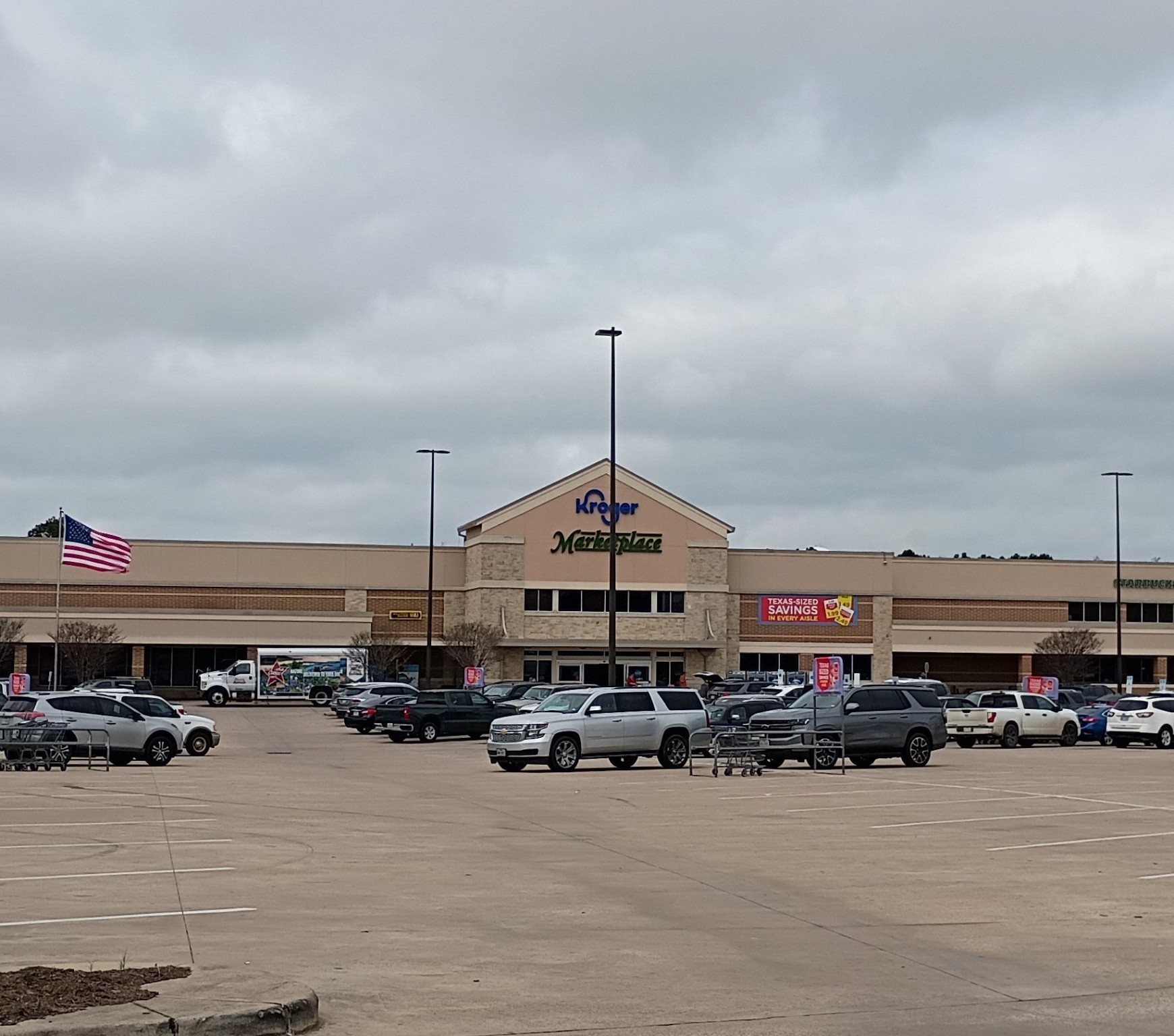 Tbd Young Street Willis, TX 77378 - Photo 11 of 12 a car is parked in front of the building