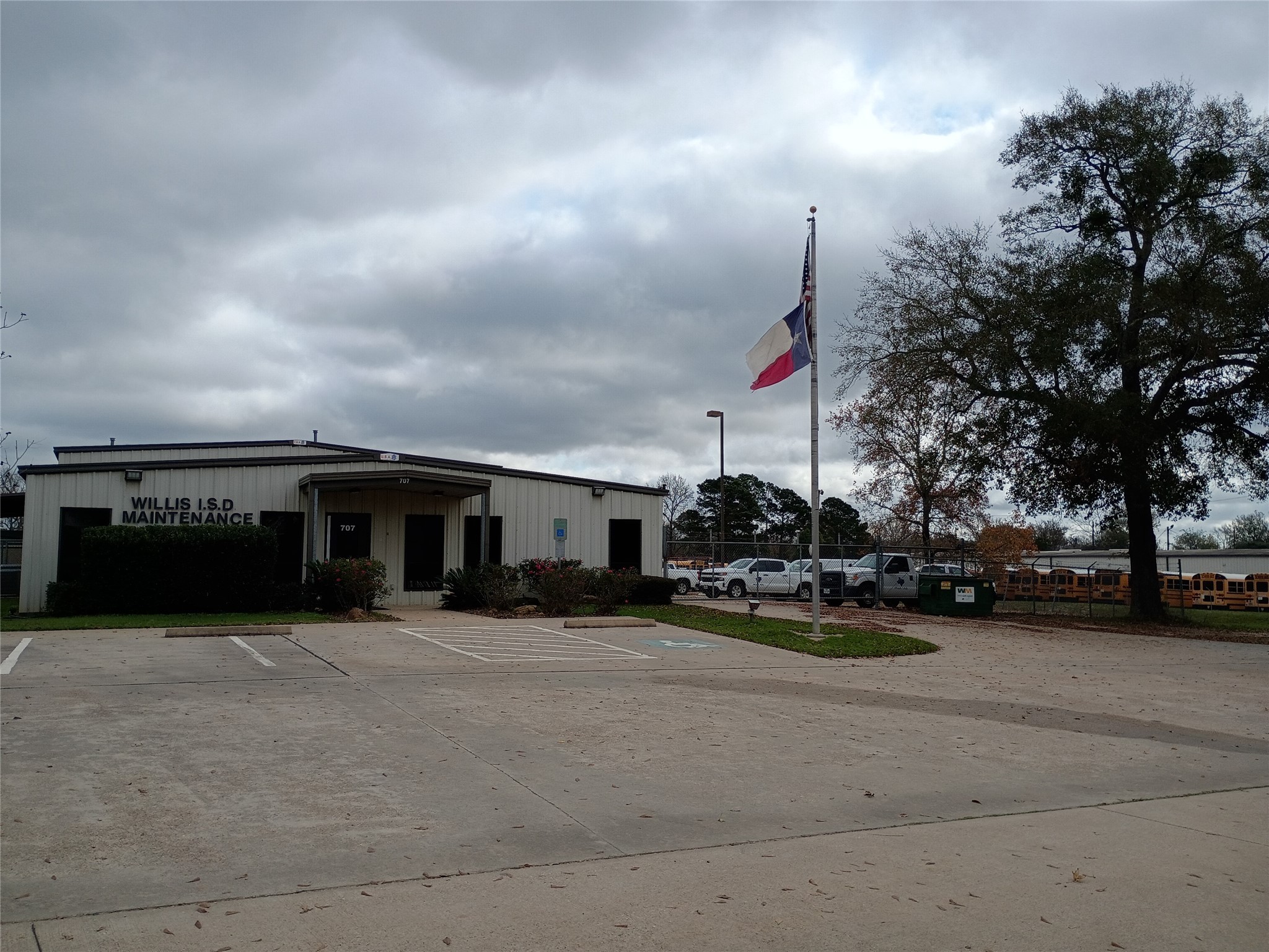Tbd Young Street Willis, TX 77378 - Photo 9 of 12 a view of a town with cars park