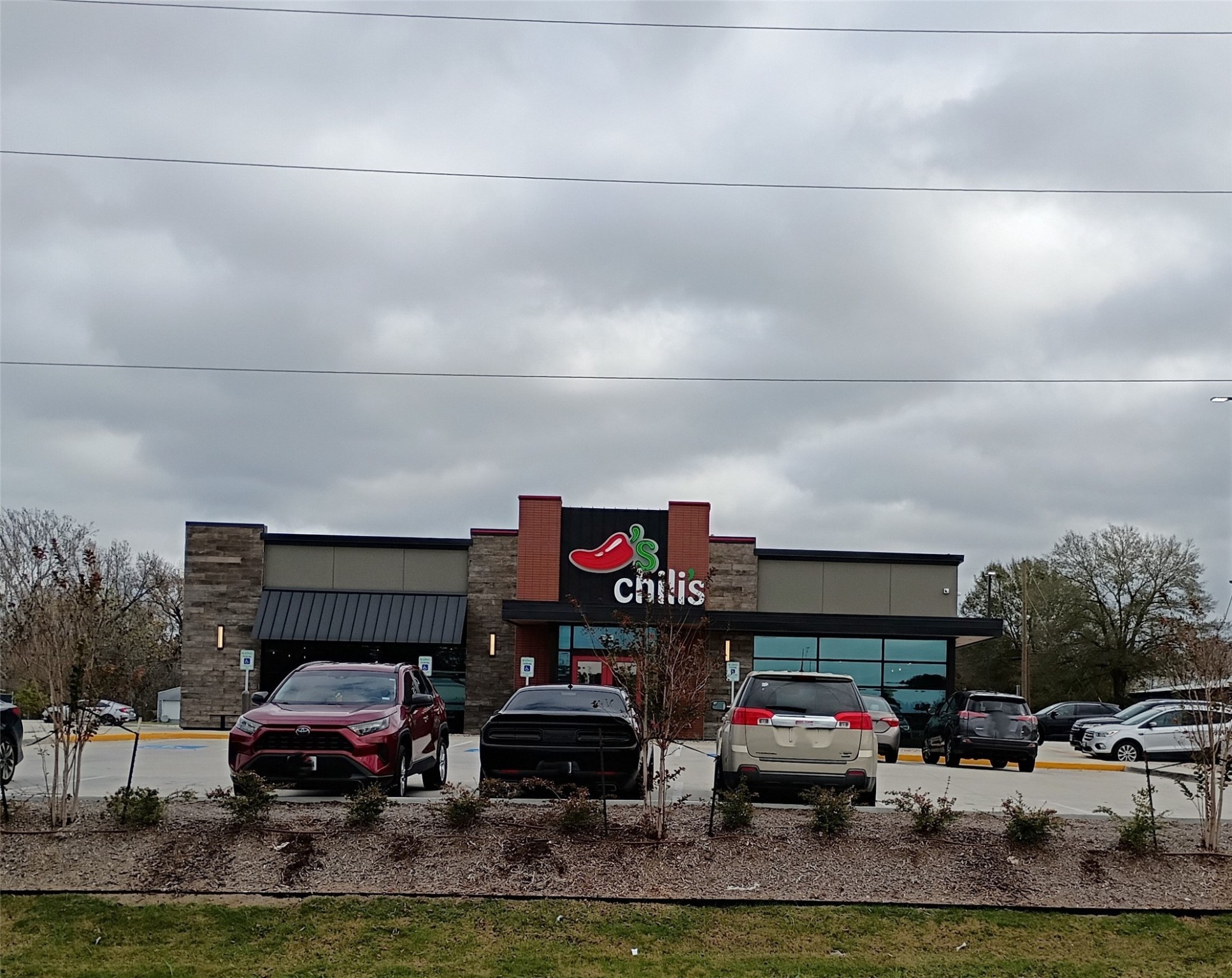 Tbd Young Street Willis, TX 77378 - Photo 10 of 12 a car parked in garage