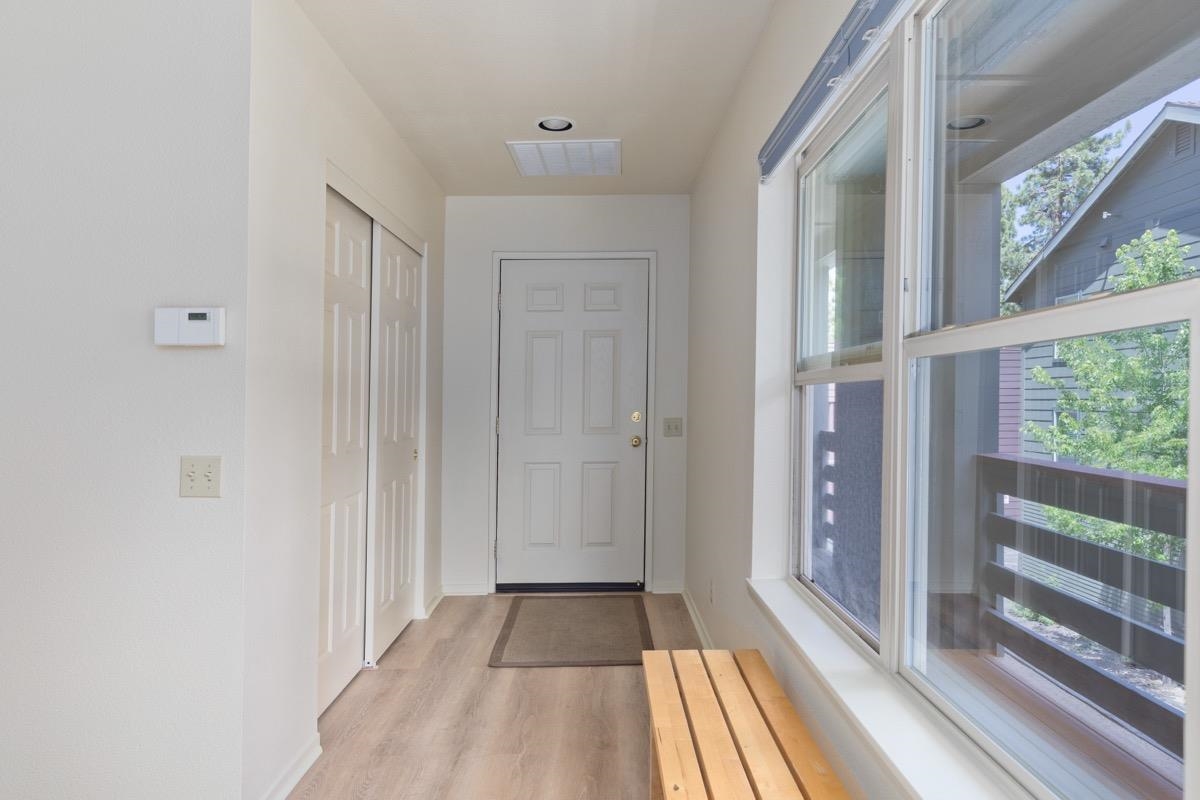 550 Mono Street, Unit C202 Mammoth Lakes, CA 93546 - Photo 9 of 36 a view of a room with a large window with wooden floor