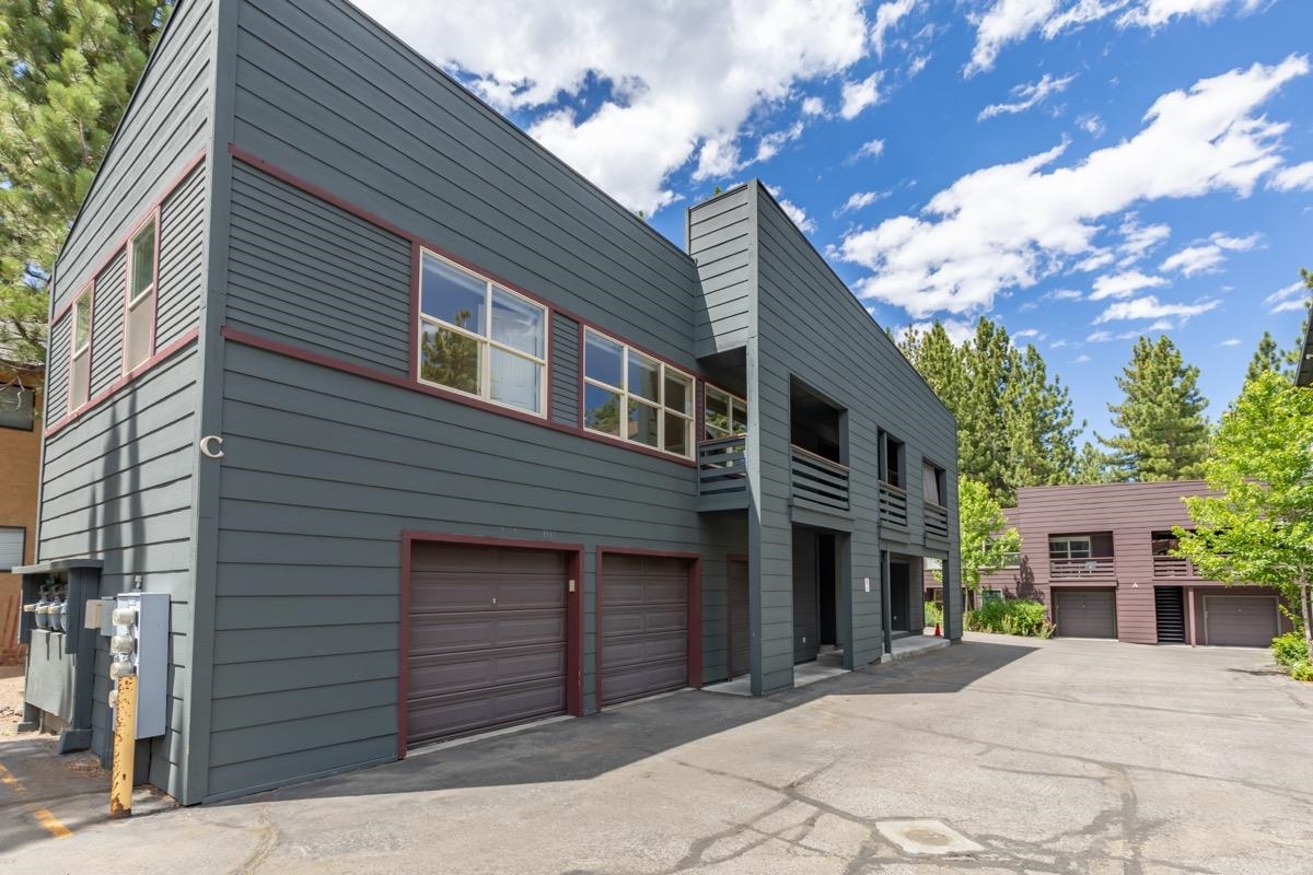 550 Mono Street, Unit C202 Mammoth Lakes, CA 93546 - Photo 20 of 36 a front view of a house with a yard