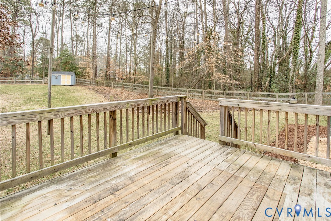 1561 Burning Tree Road Henrico, VA 23231 - Photo 27 of 29 a view of balcony with wooden floor and fence
