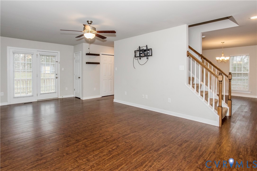 1561 Burning Tree Road Henrico, VA 23231 - Photo 7 of 29 wooden floor in an empty room with a window