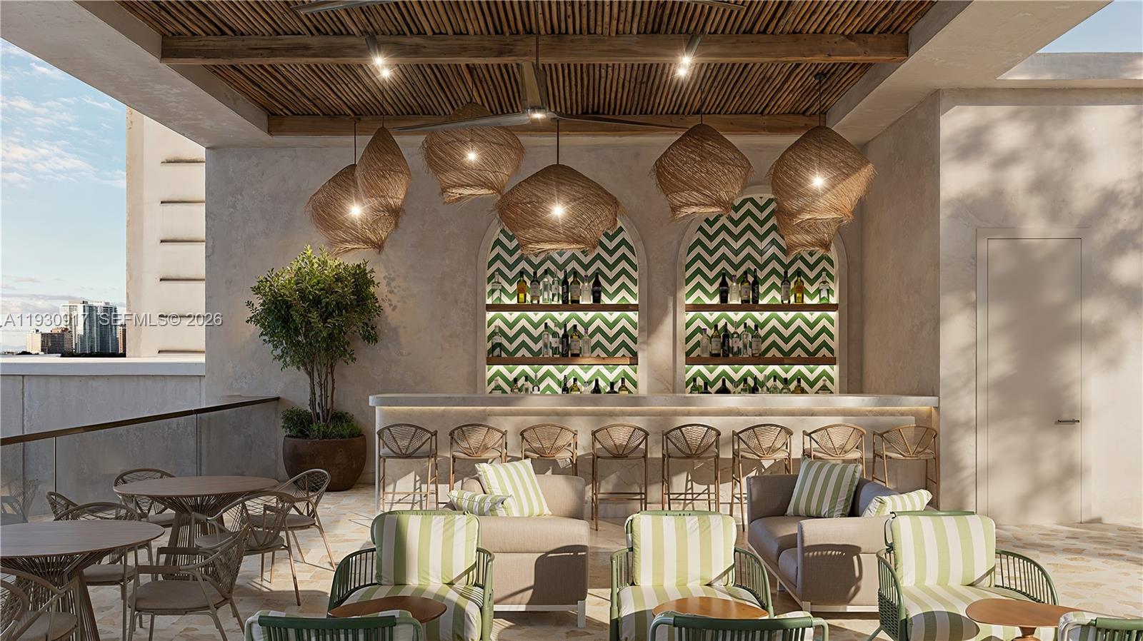 1741 Southwest 2nd Avenue, Unit 702 Miami, FL 33129 - Photo 13 of 17 a room with lots of chairs and a chandelier