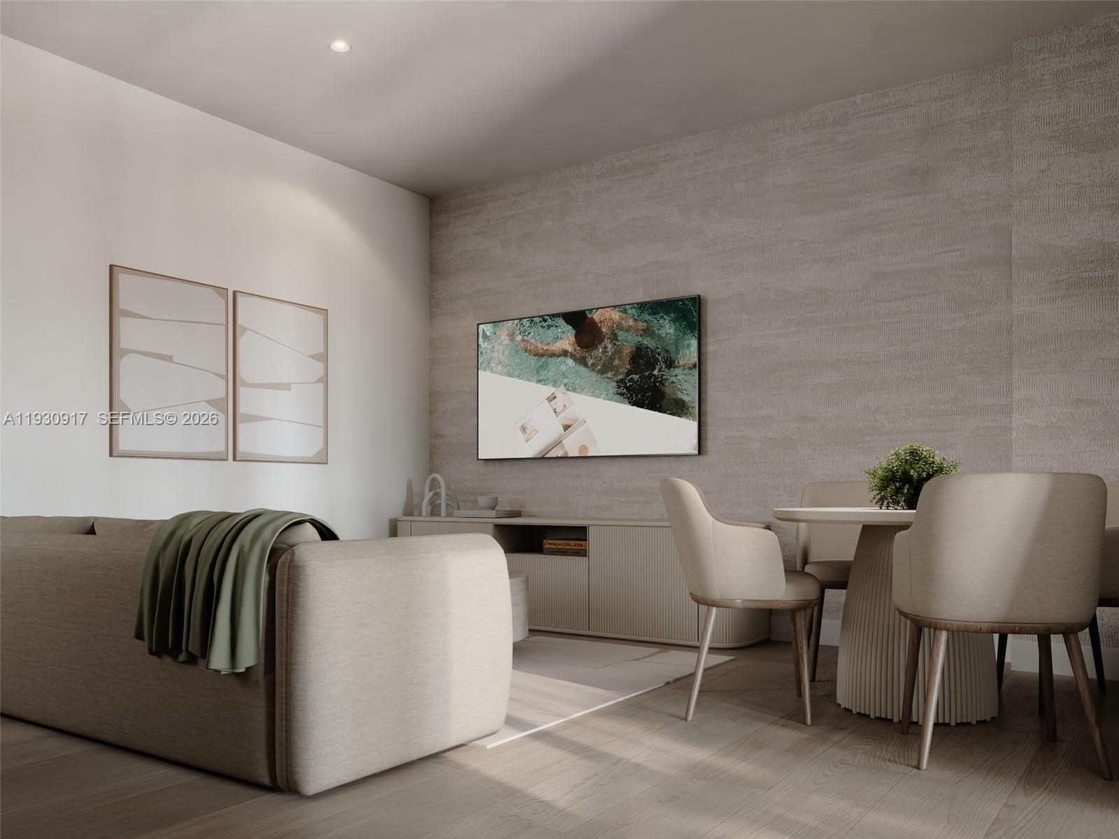 1741 Southwest 2nd Avenue, Unit 702 Miami, FL 33129 - Photo 2 of 17 a living room with furniture and a flat screen tv