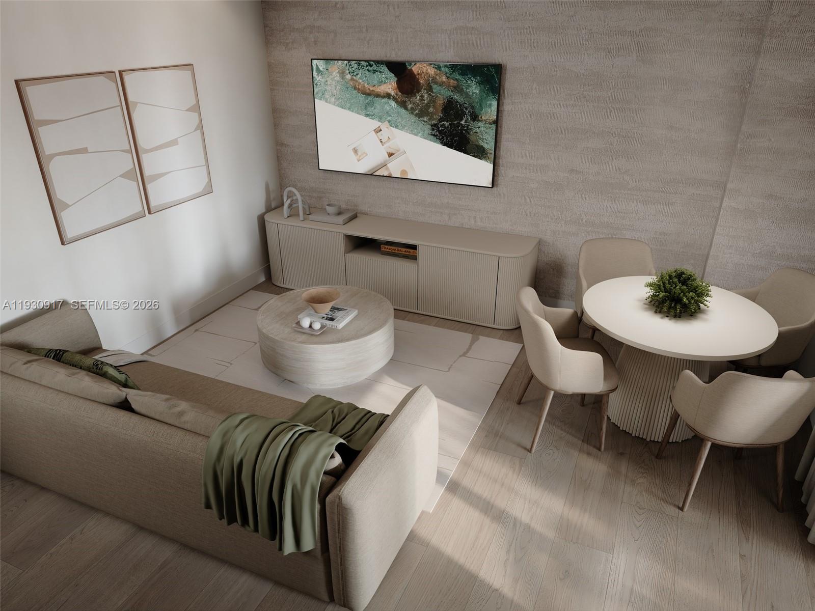 1741 Southwest 2nd Avenue, Unit 702 Miami, FL 33129 - Photo 4 of 17 a living room with furniture and a dining table with chair