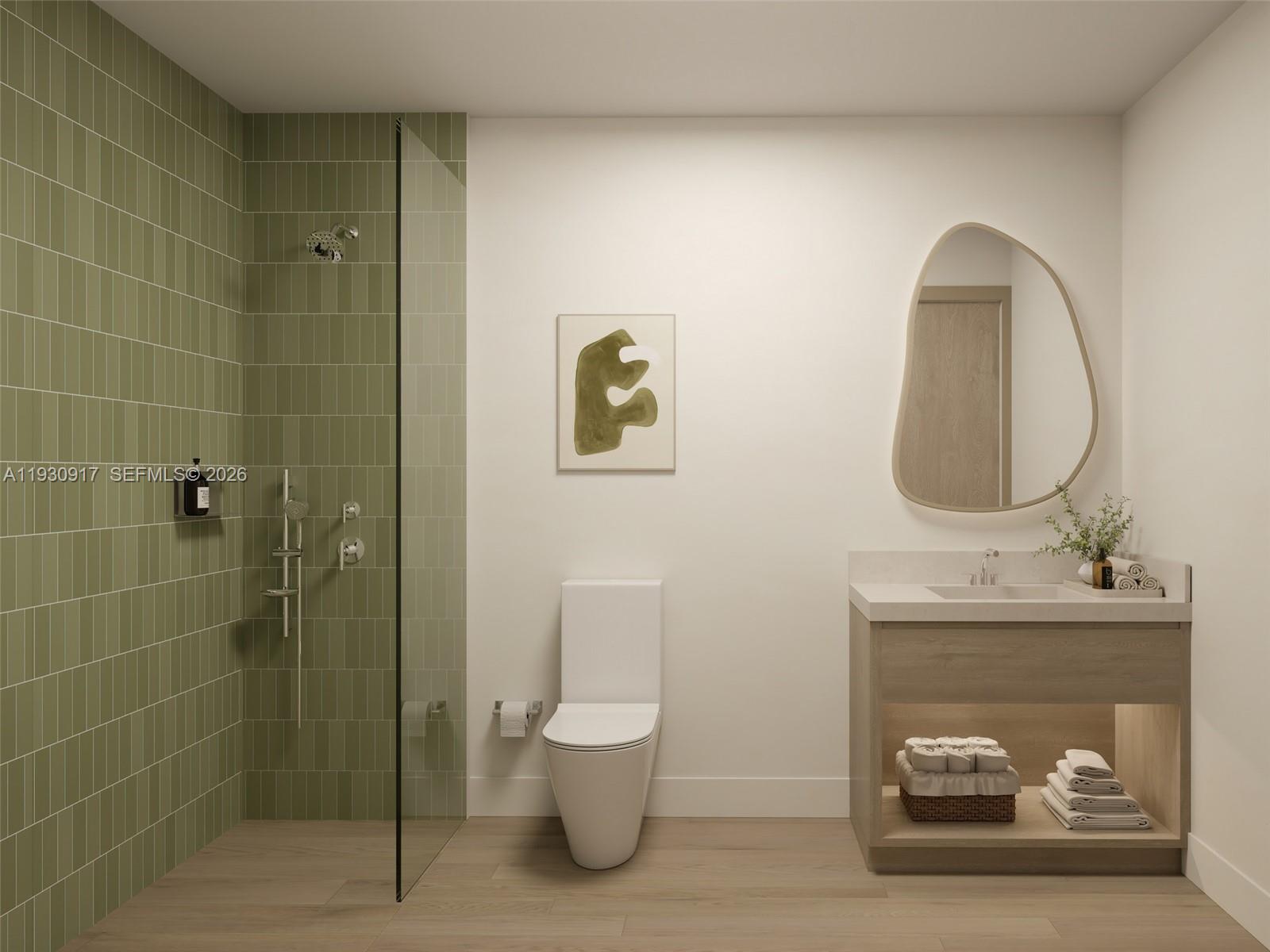 1741 Southwest 2nd Avenue, Unit 702 Miami, FL 33129 - Photo 7 of 17 a bathroom with a toilet sink and mirror