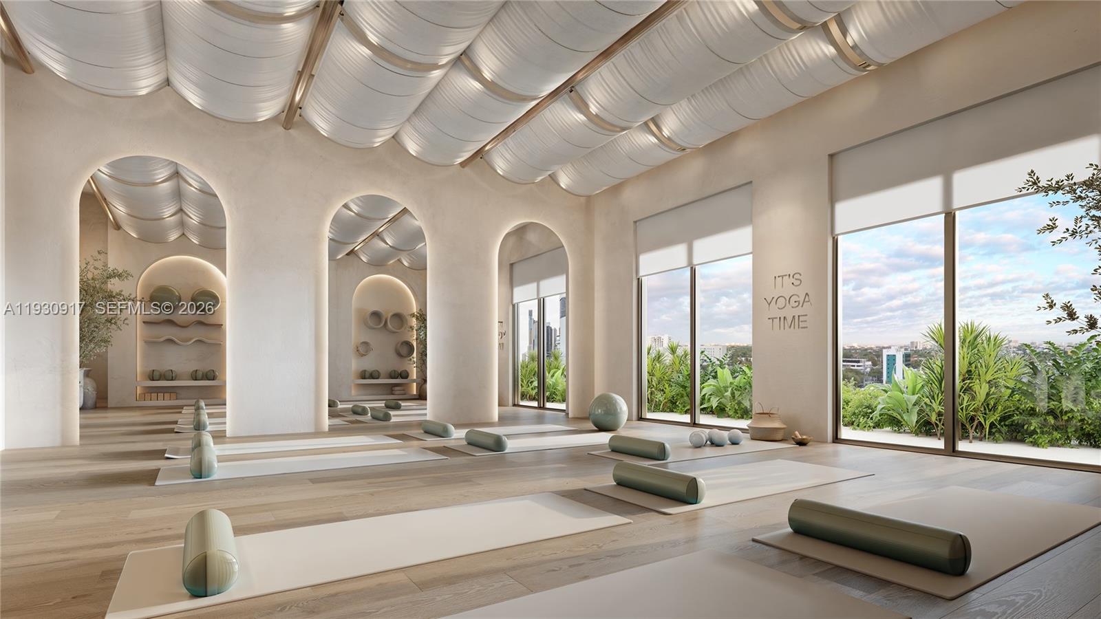 1741 Southwest 2nd Avenue, Unit 702 Miami, FL 33129 - Photo 8 of 17 a living room with fireplace furniture and a large window