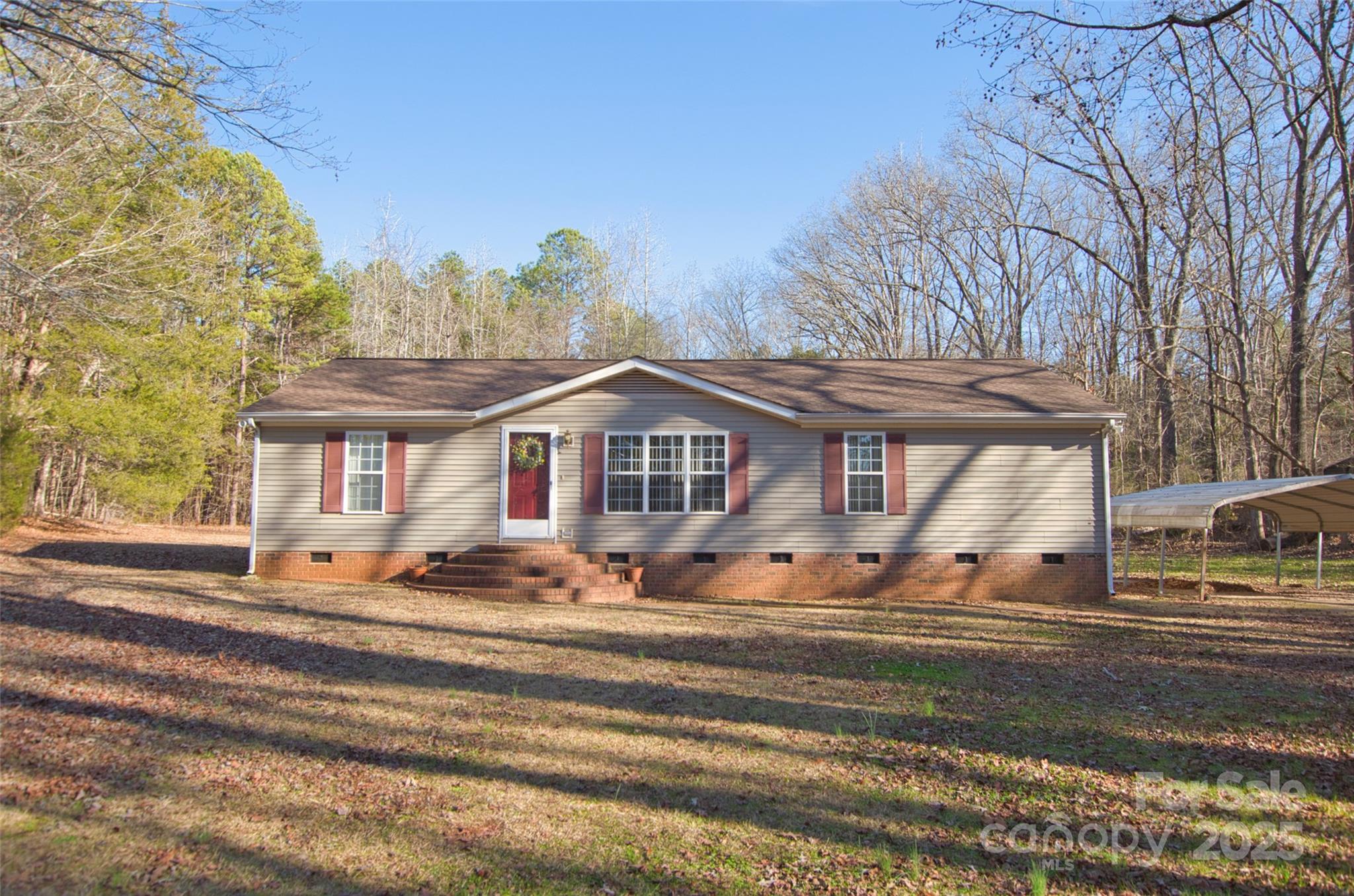 150 Orindawood Road McConnells, SC 29726 - Photo 1 of 21 a front view of a house with a yard