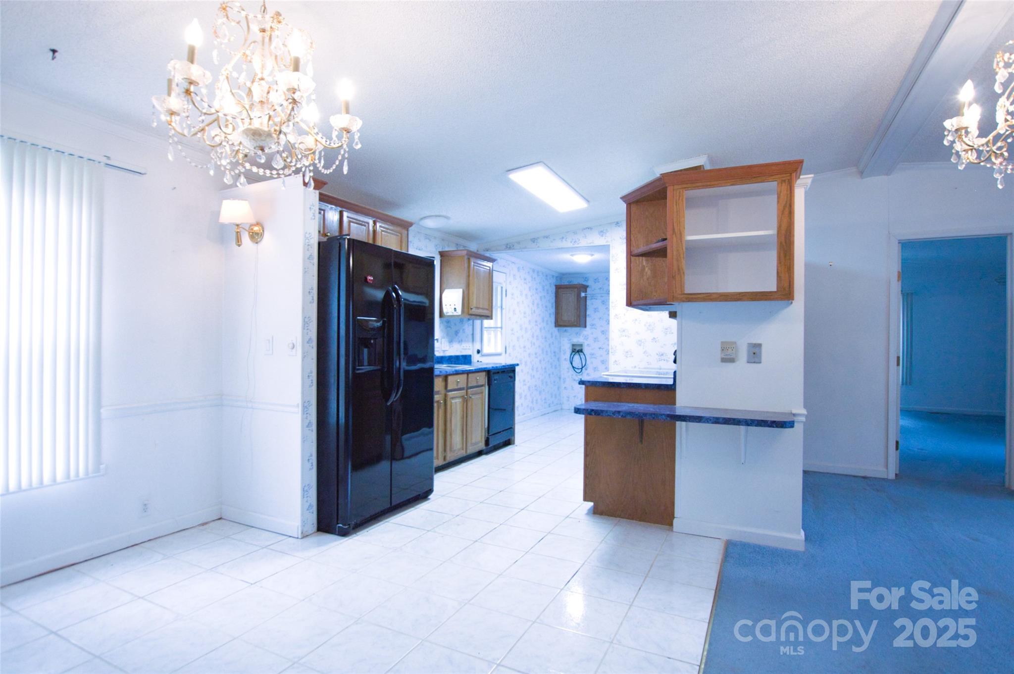 150 Orindawood Road McConnells, SC 29726 - Photo 11 of 21 a view of a kitchen with a sink and a refrigerator