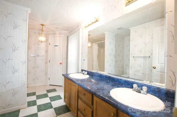 a bathroom with a shower and a toilet