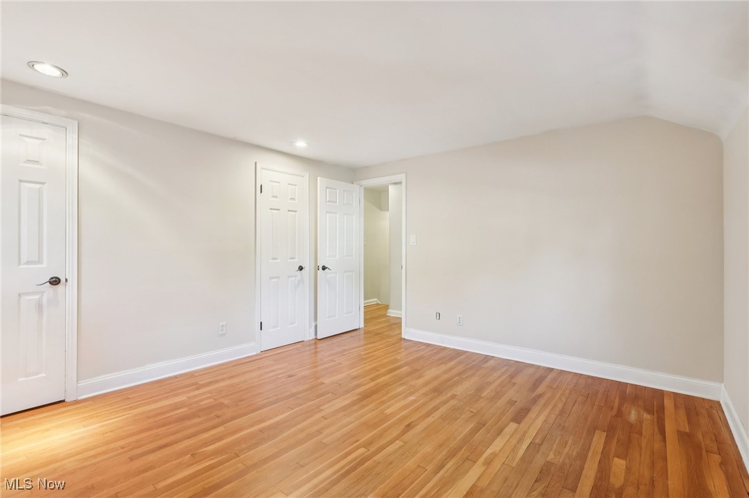 1151 Croyden Road Lyndhurst, OH 44124 - Photo 33 of 37 bedroom with light wood finished floors, recessed lighting