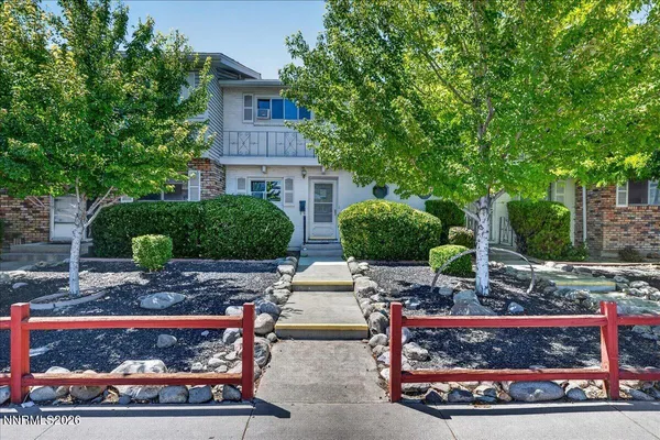 a view of house with outdoor space