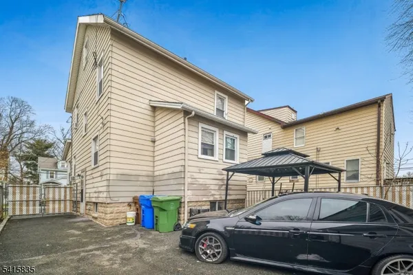 a car parked in front of a house